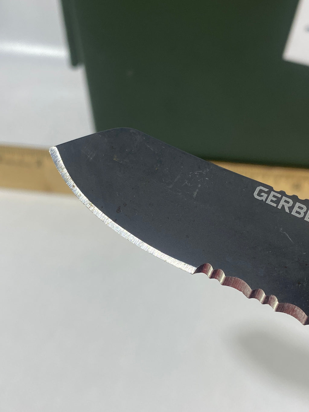 Gerber #-60. E-Z Out DPSF. Light usage. Dings on blade. Dirty.