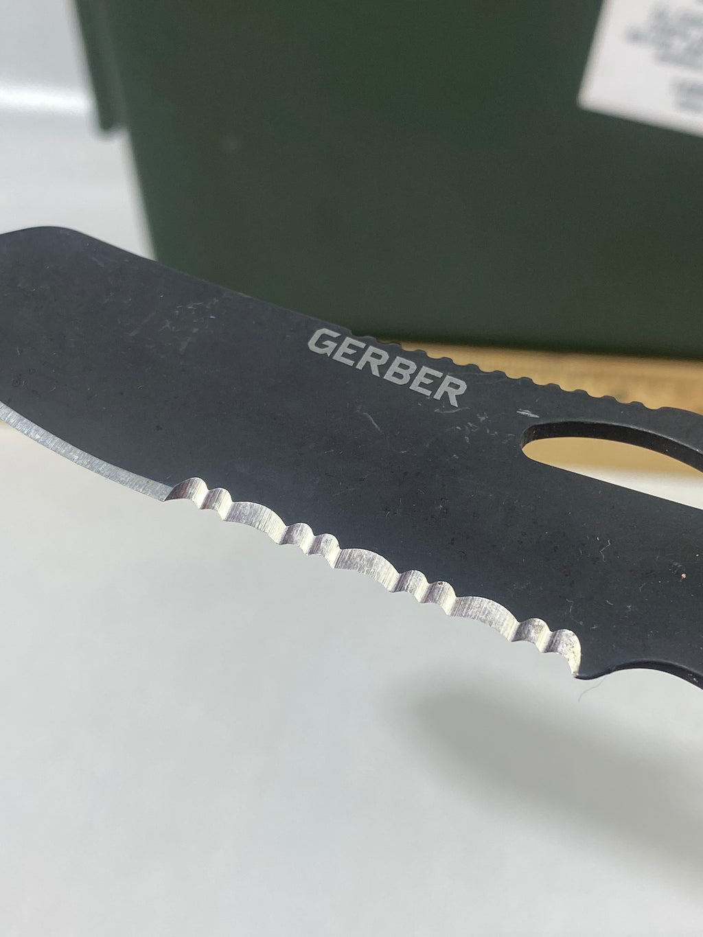 Gerber #-60. E-Z Out DPSF. Light usage. Dings on blade. Dirty.