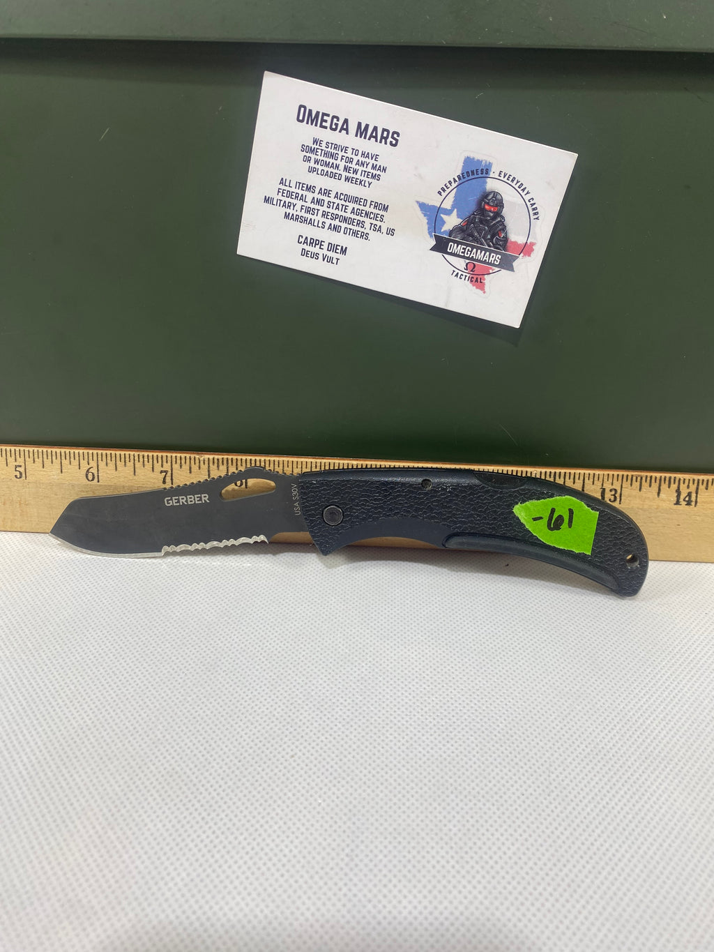 Gerber #-61. E-Z Out DPSF. Light usage. Dings on blade.