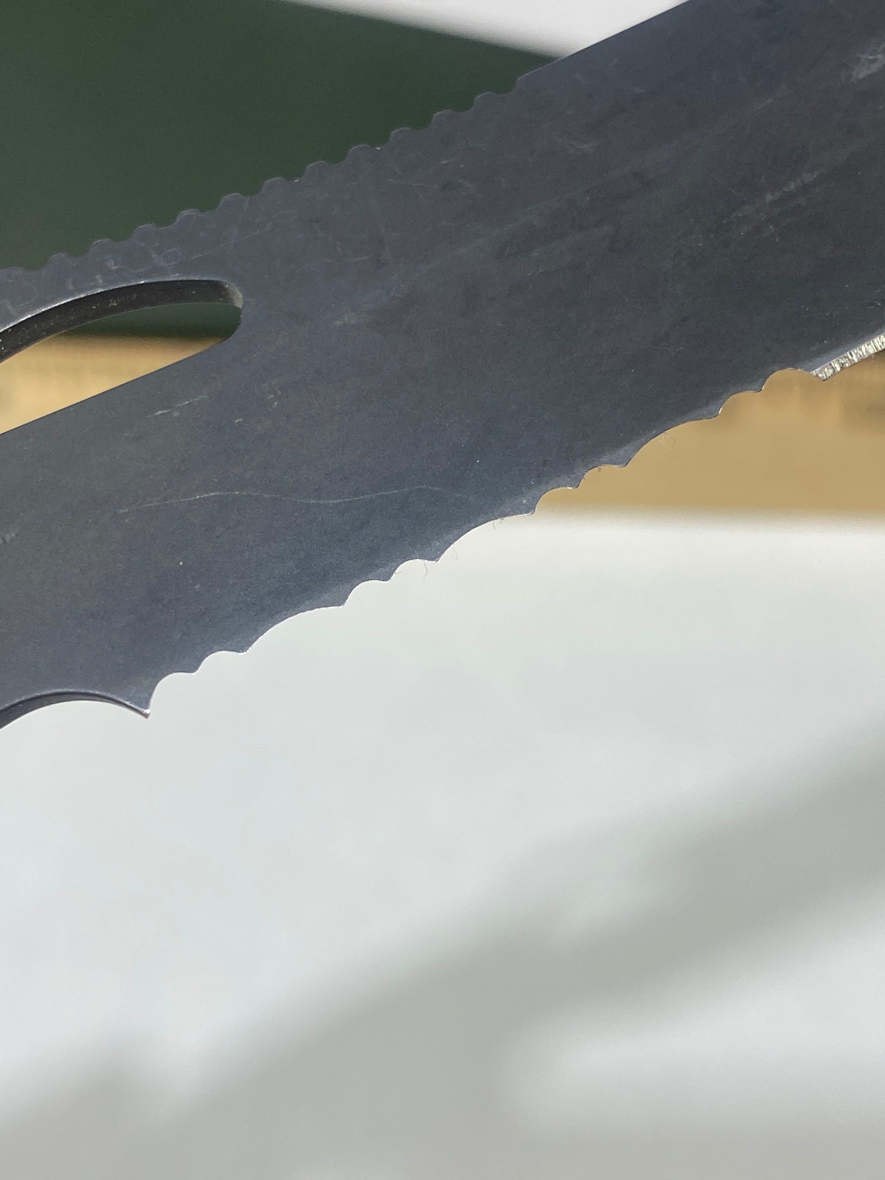 Gerber #-61. E-Z Out DPSF. Light usage. Dings on blade.