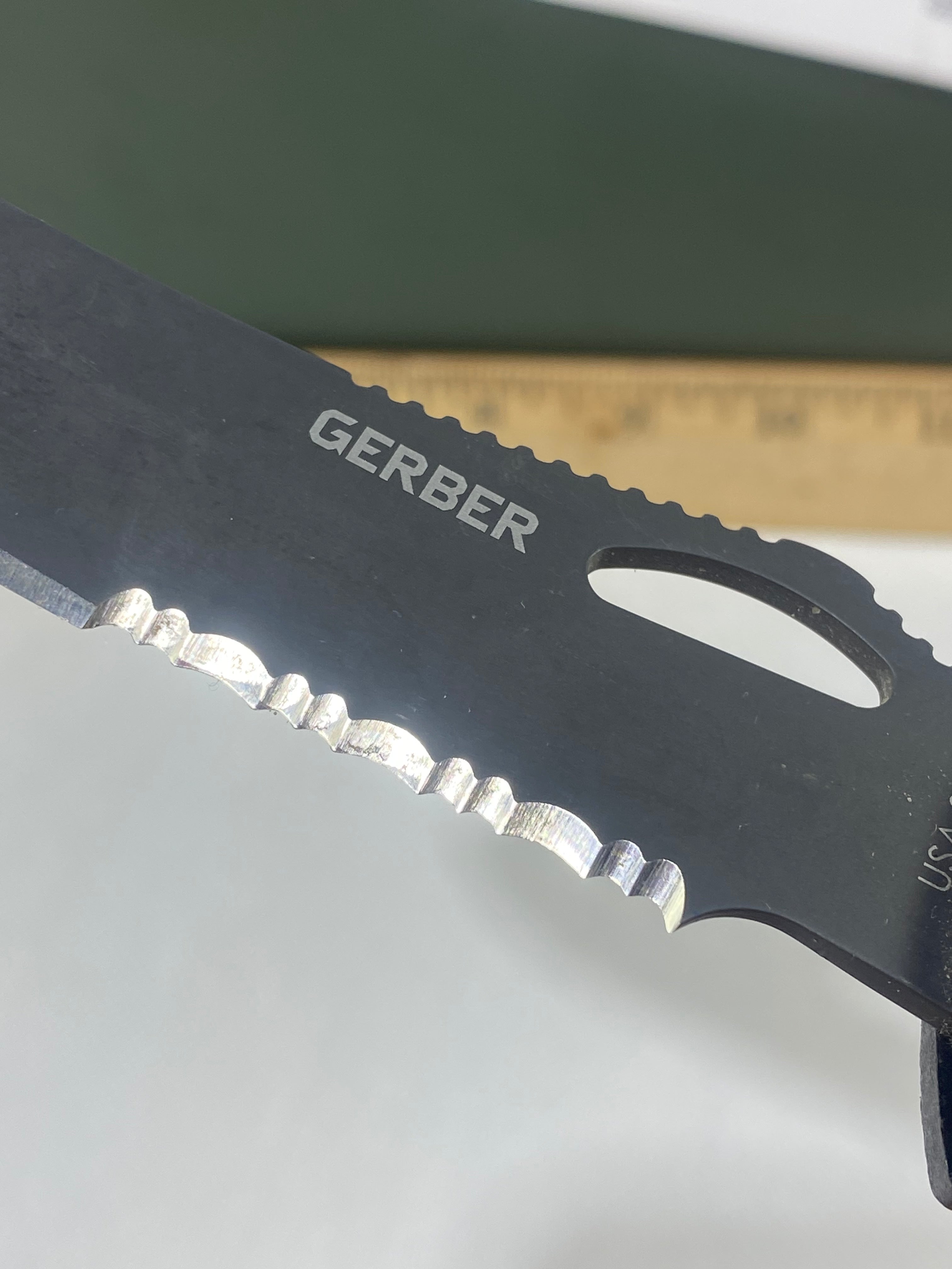Gerber #-61. E-Z Out DPSF. Light usage. Dings on blade.