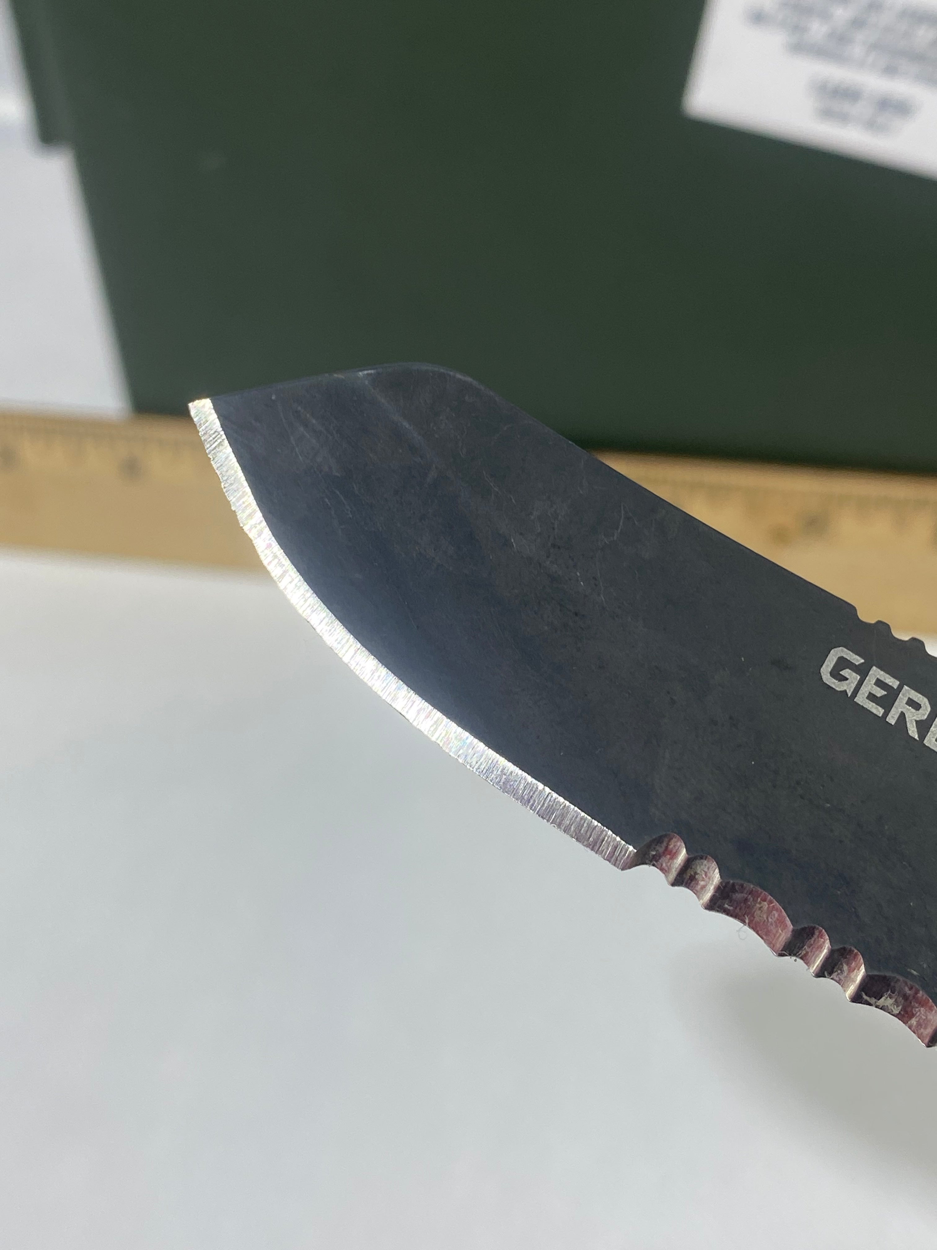 Gerber #-61. E-Z Out DPSF. Light usage. Dings on blade.