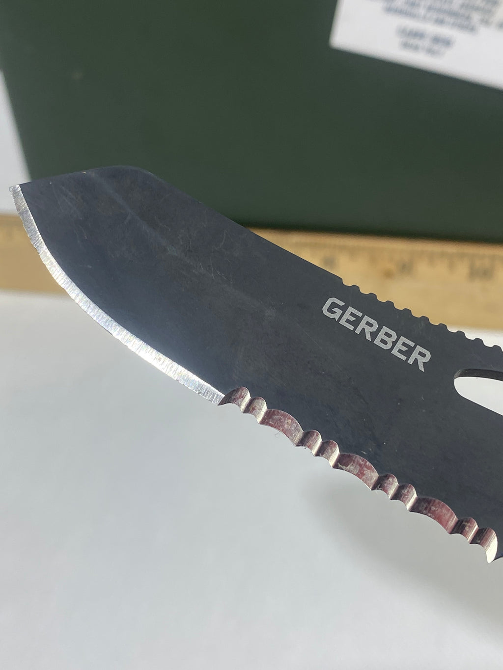 Gerber #-61. E-Z Out DPSF. Light usage. Dings on blade.