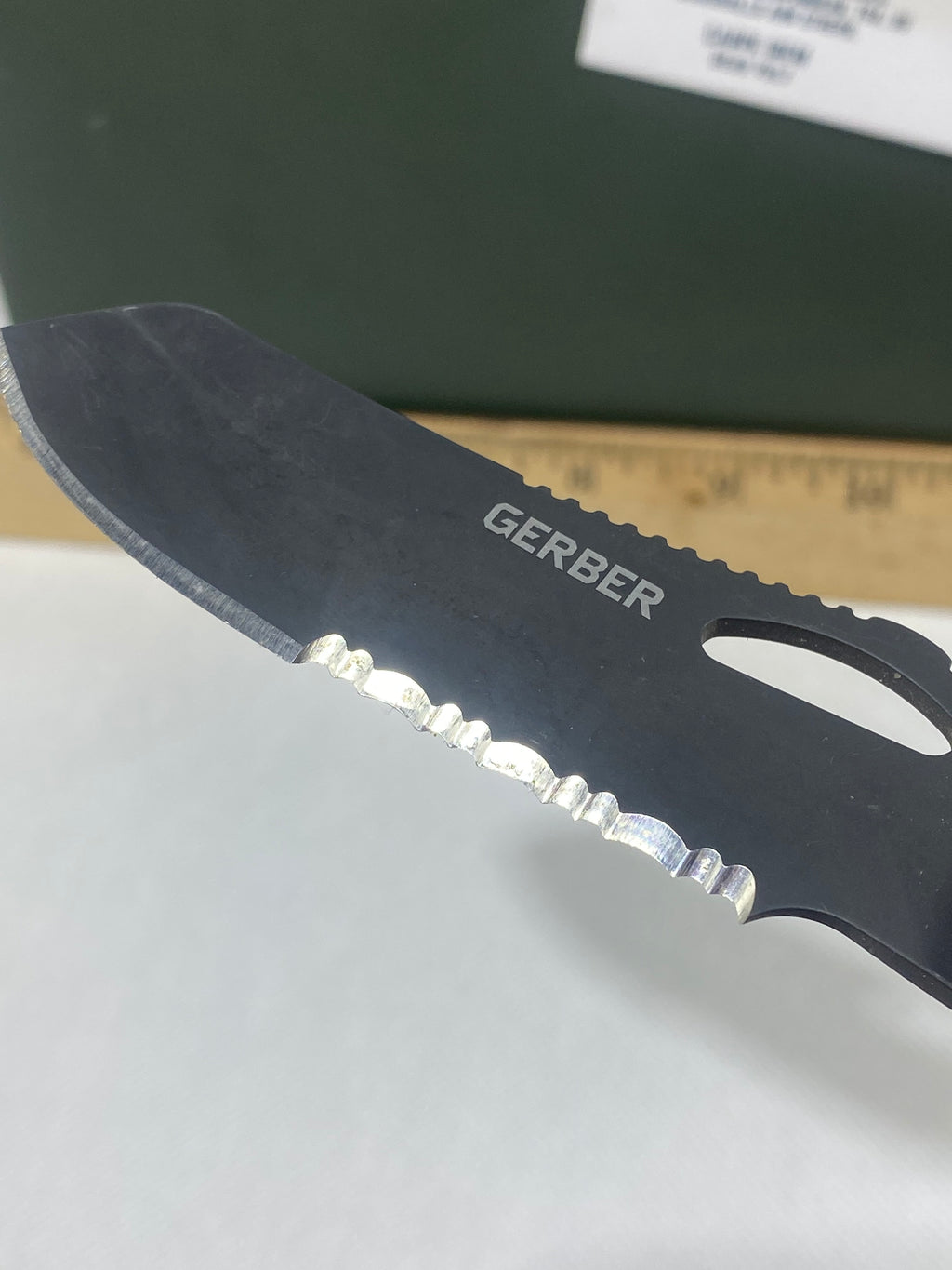 Gerber #-61. E-Z Out DPSF. Light usage. Dings on blade.