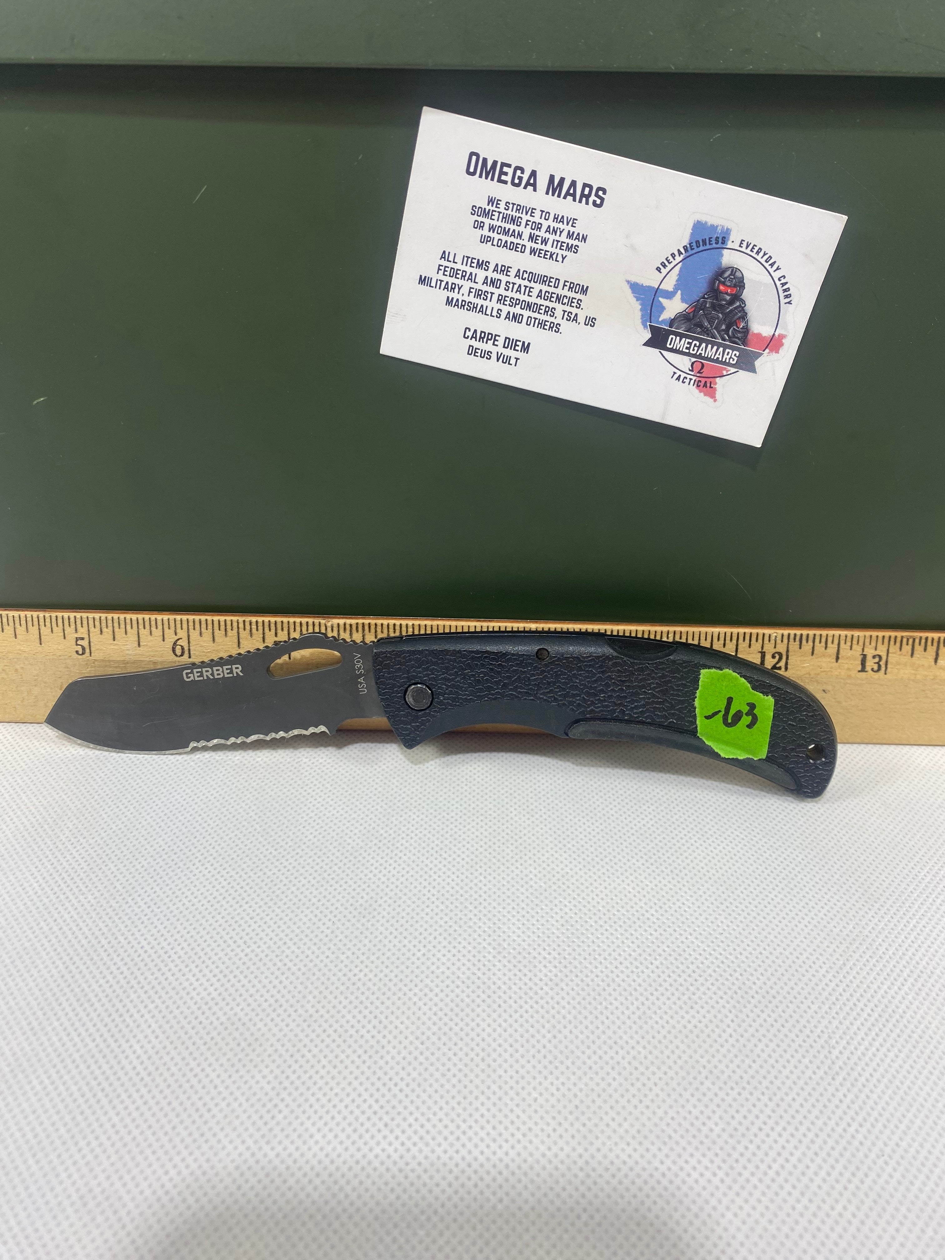 Gerber #-63. E-Z Out DPSF. Light usage. Pocket clip bent out.