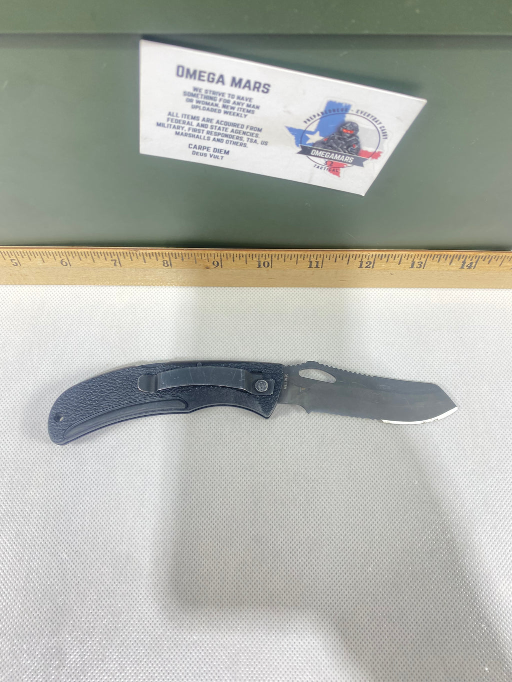 Gerber #-63. E-Z Out DPSF. Light usage. Pocket clip bent out.