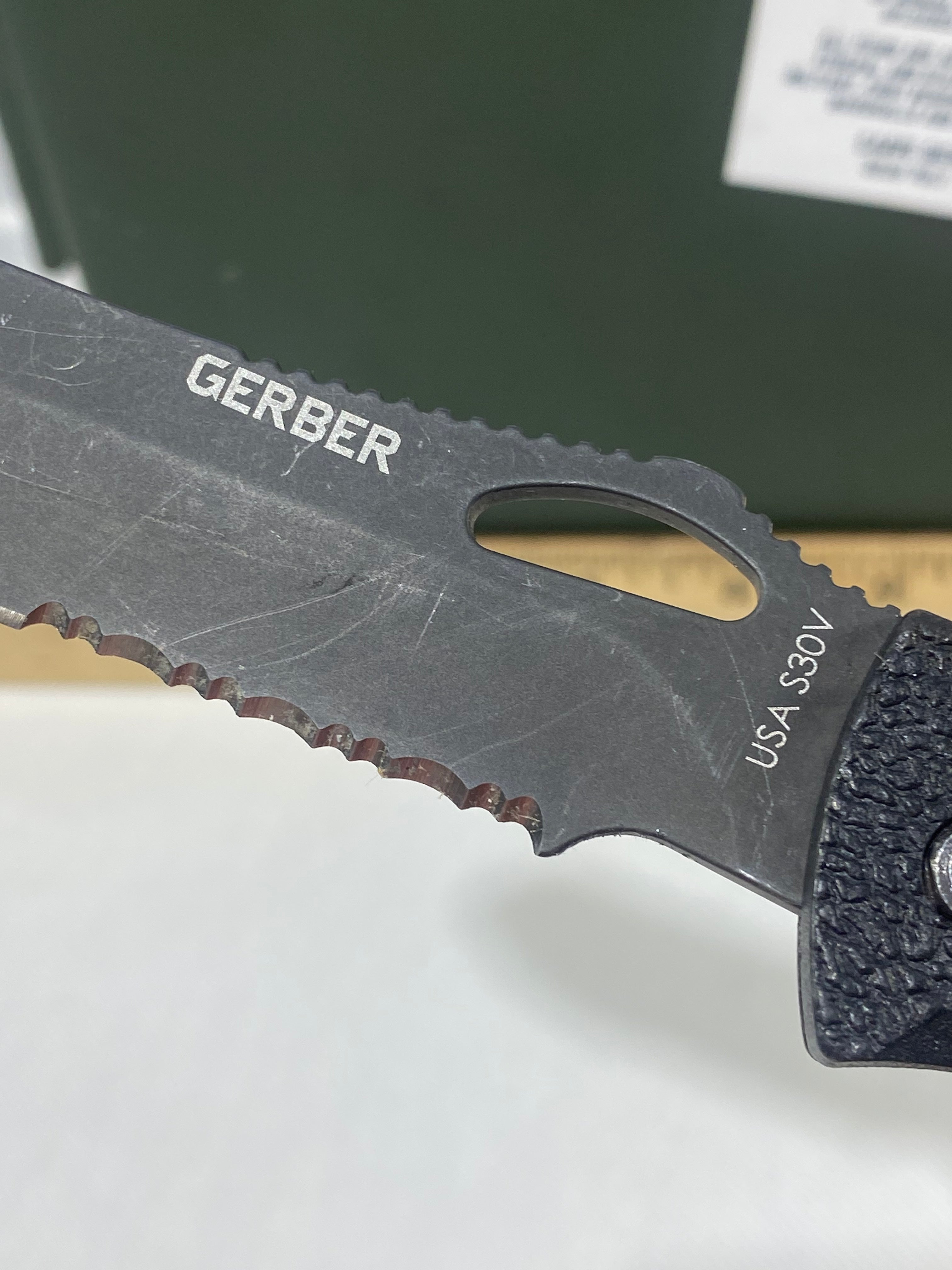 Gerber #-63. E-Z Out DPSF. Light usage. Pocket clip bent out.