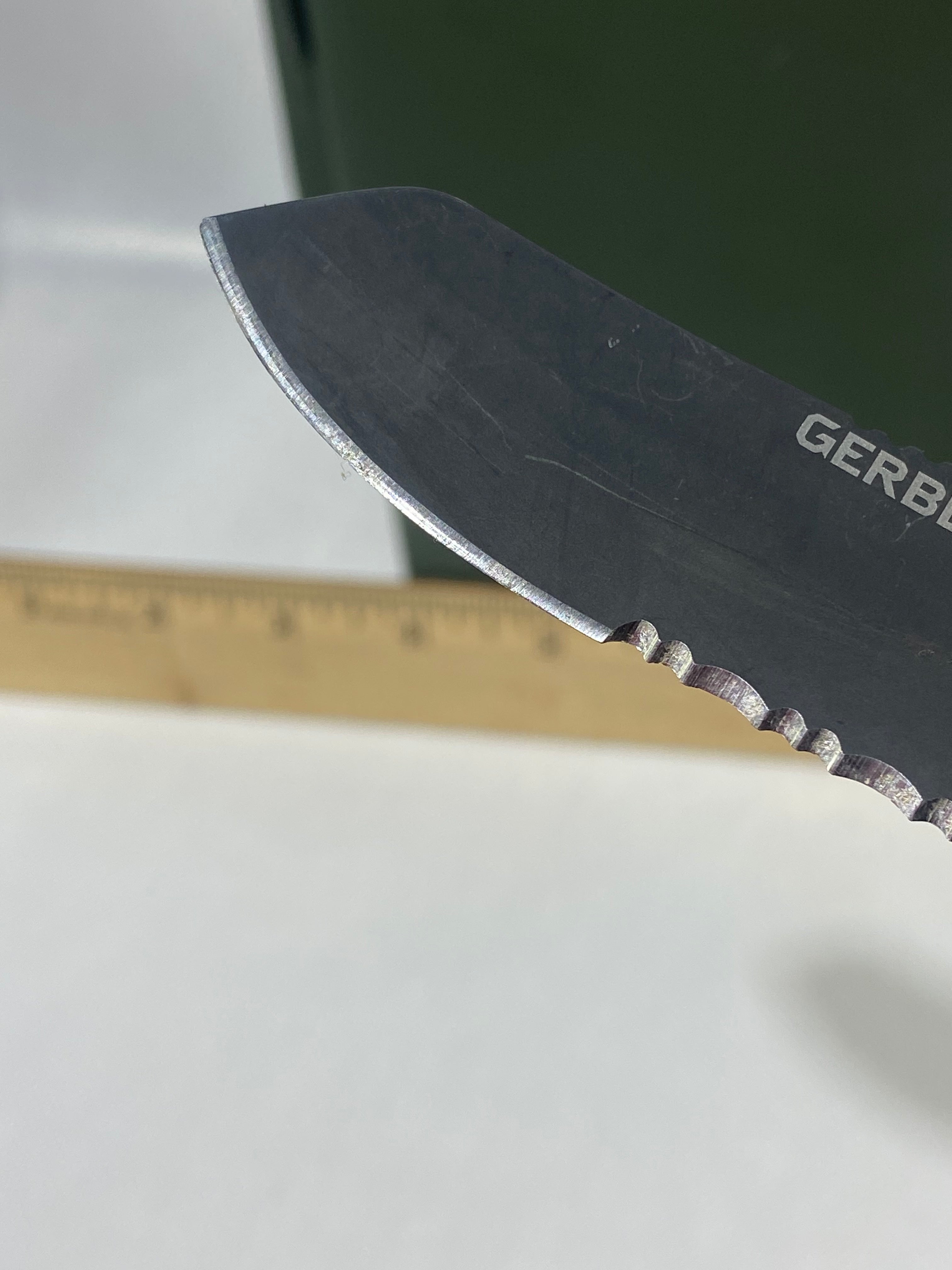 Gerber #-63. E-Z Out DPSF. Light usage. Pocket clip bent out.
