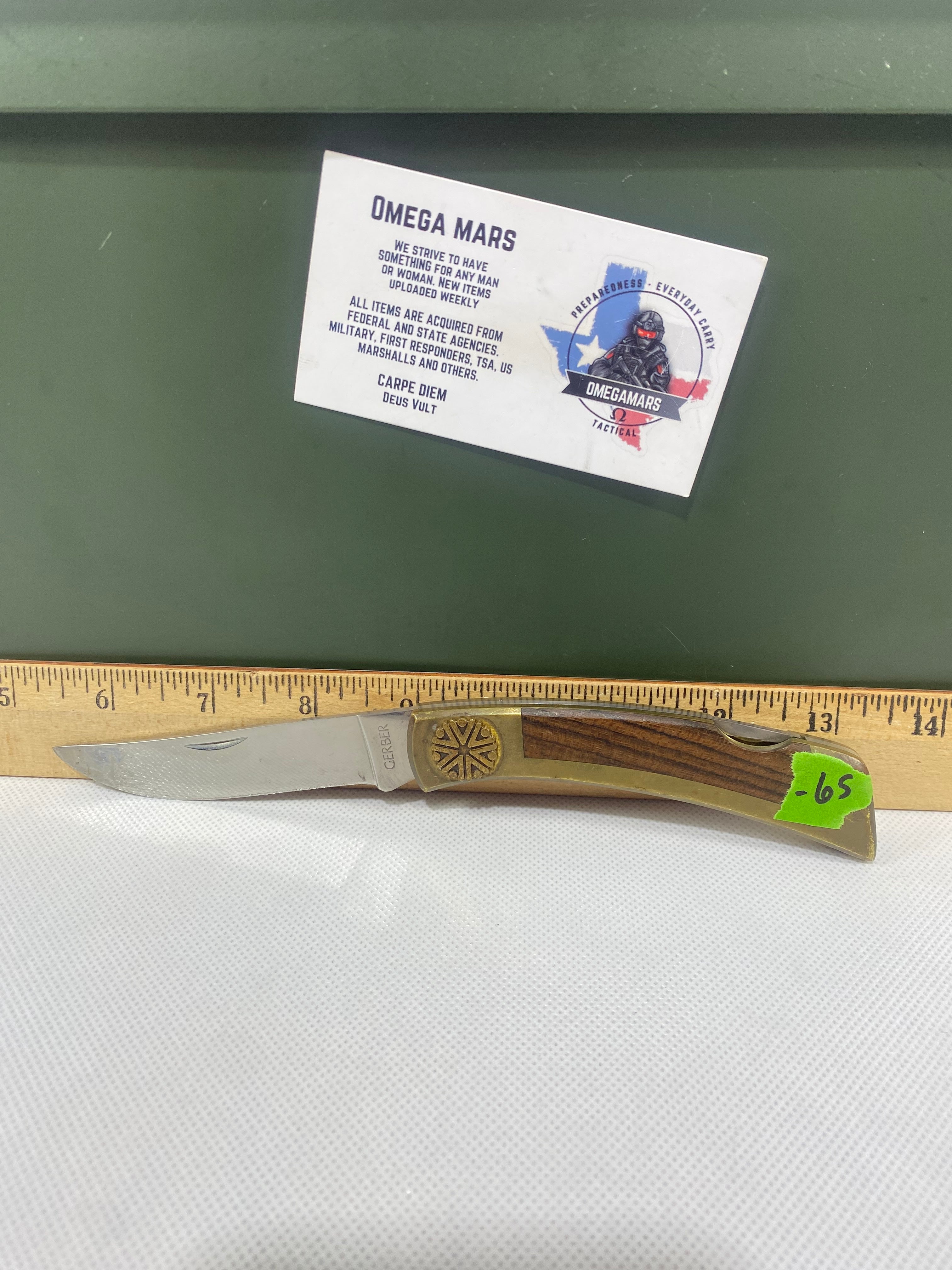 Gerber #-65. Vintage Sportsman Lock Back. Light usage. Little dirty.
