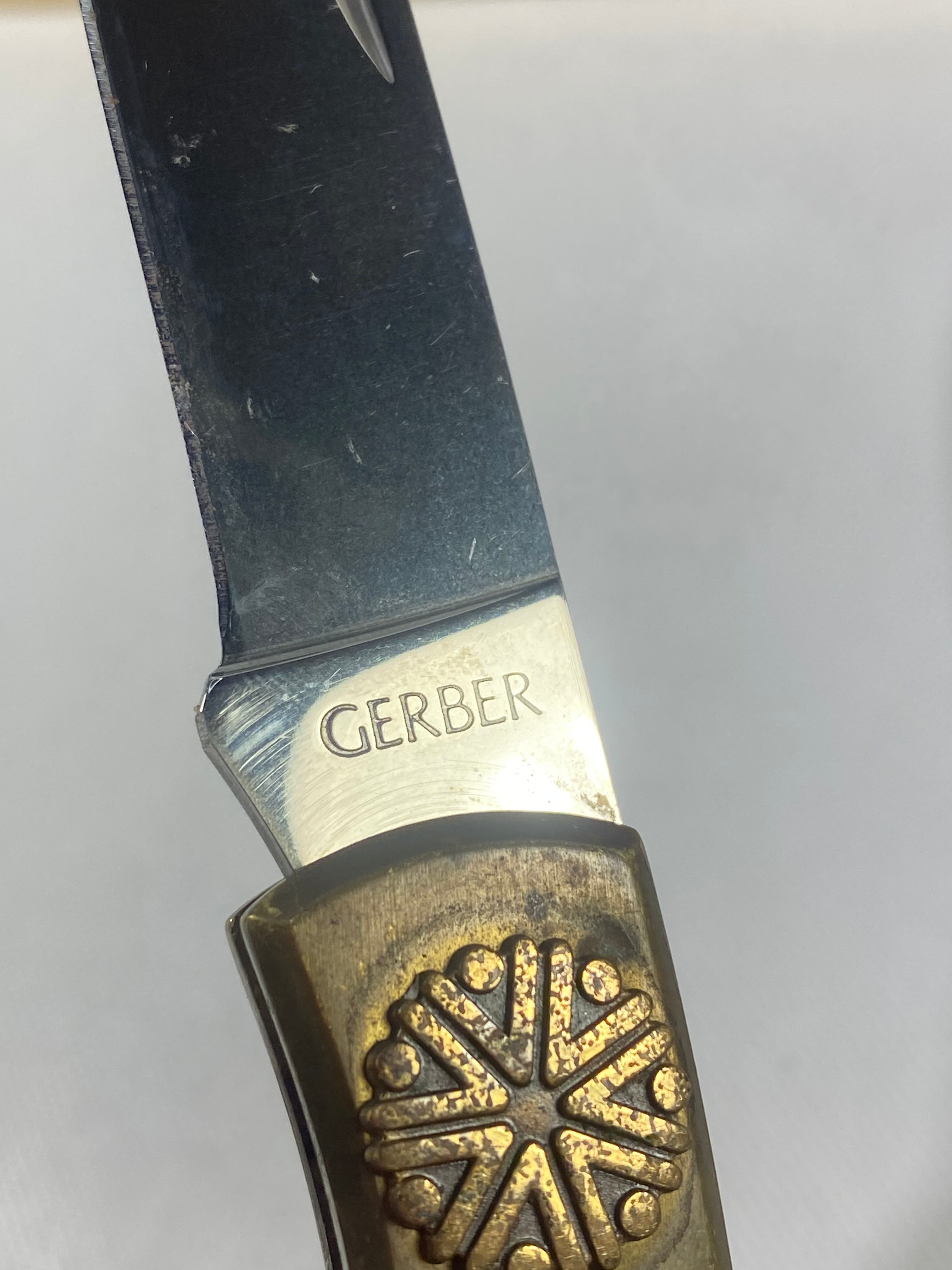Gerber #-65. Vintage Sportsman Lock Back. Light usage. Little dirty.