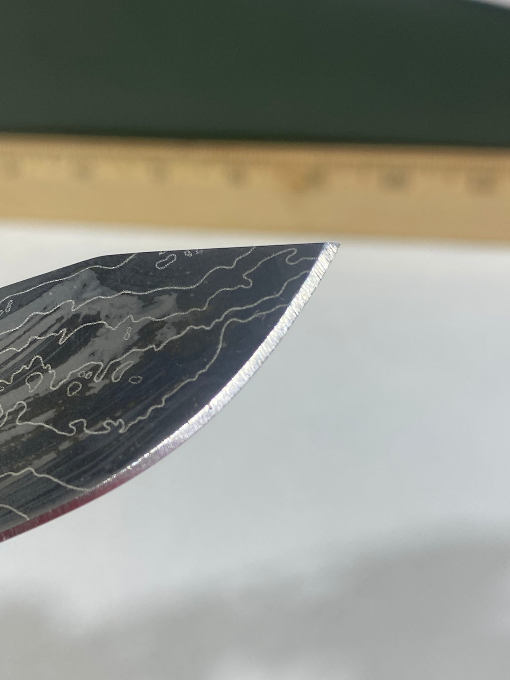 Gerber #-66. Assert. Custom etched.