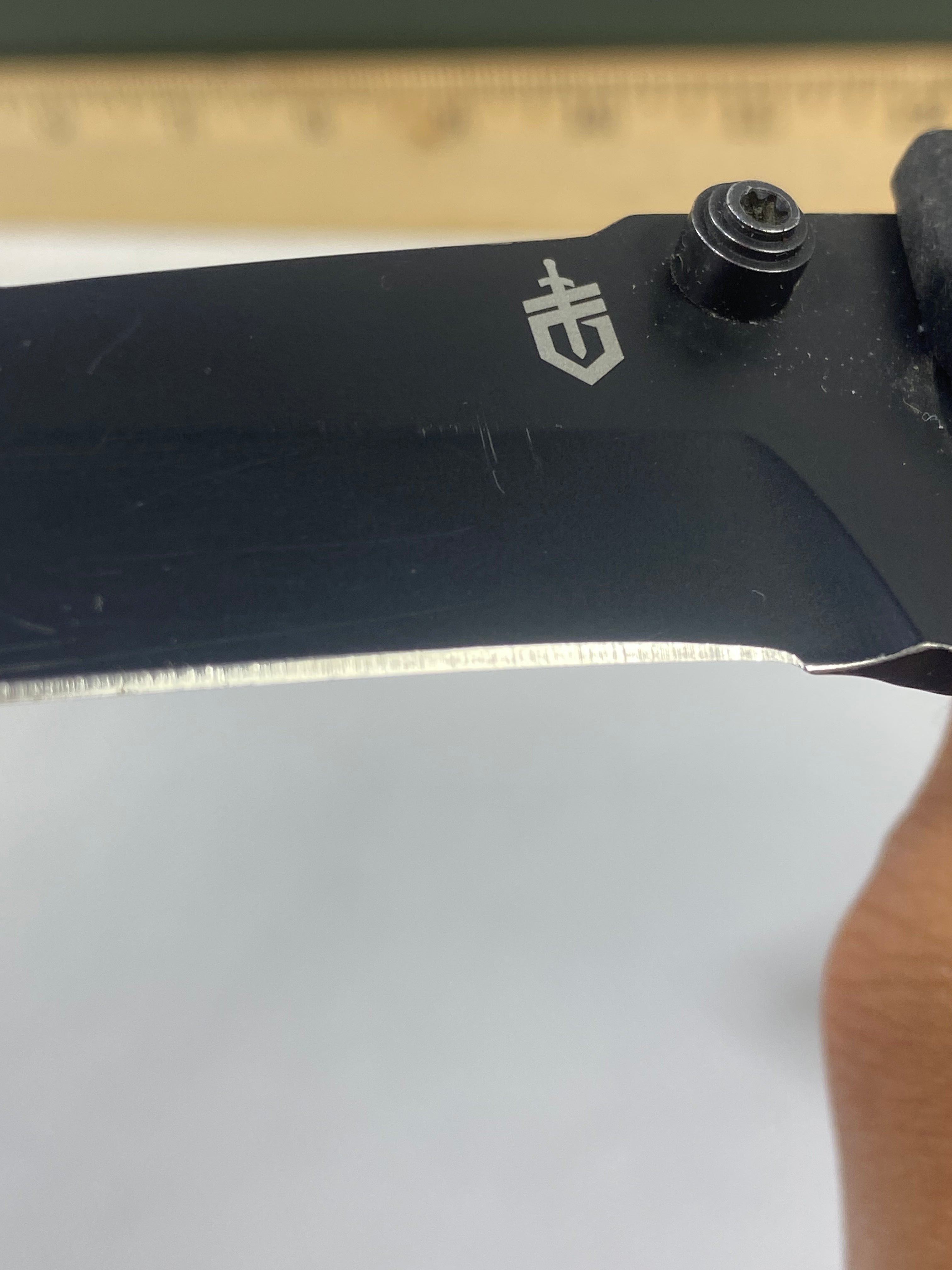 Gerber #-69. Edic. Light usage. Resharpened. Pocket Clip broken. Little dirty.