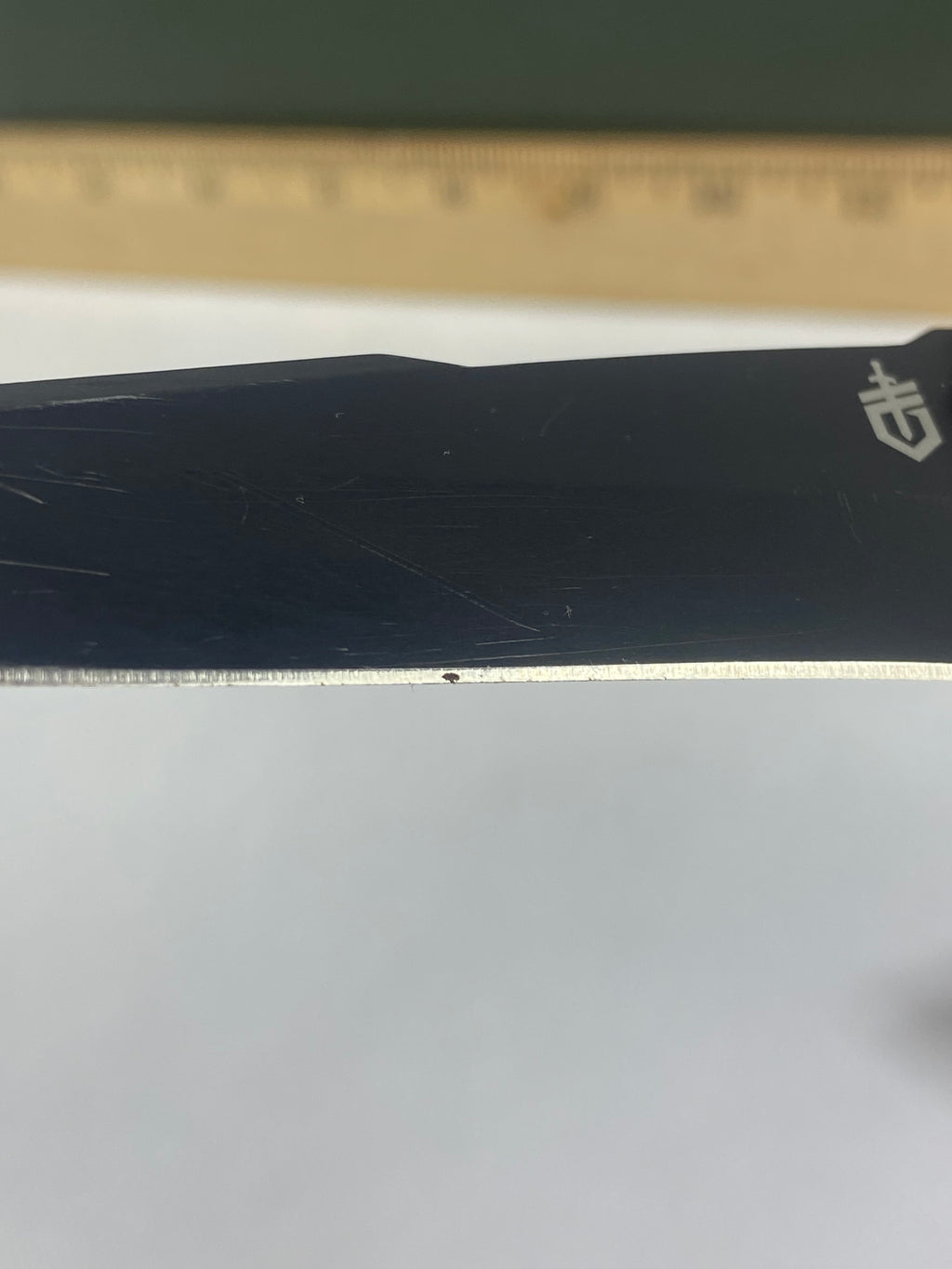 Gerber #-69. Edic. Light usage. Resharpened. Pocket Clip broken. Little dirty.