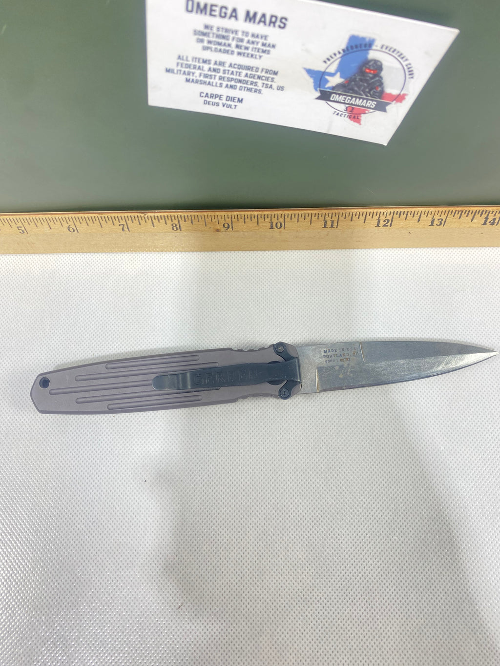 Gerber -72. Covert. Light usage. Resharpened.