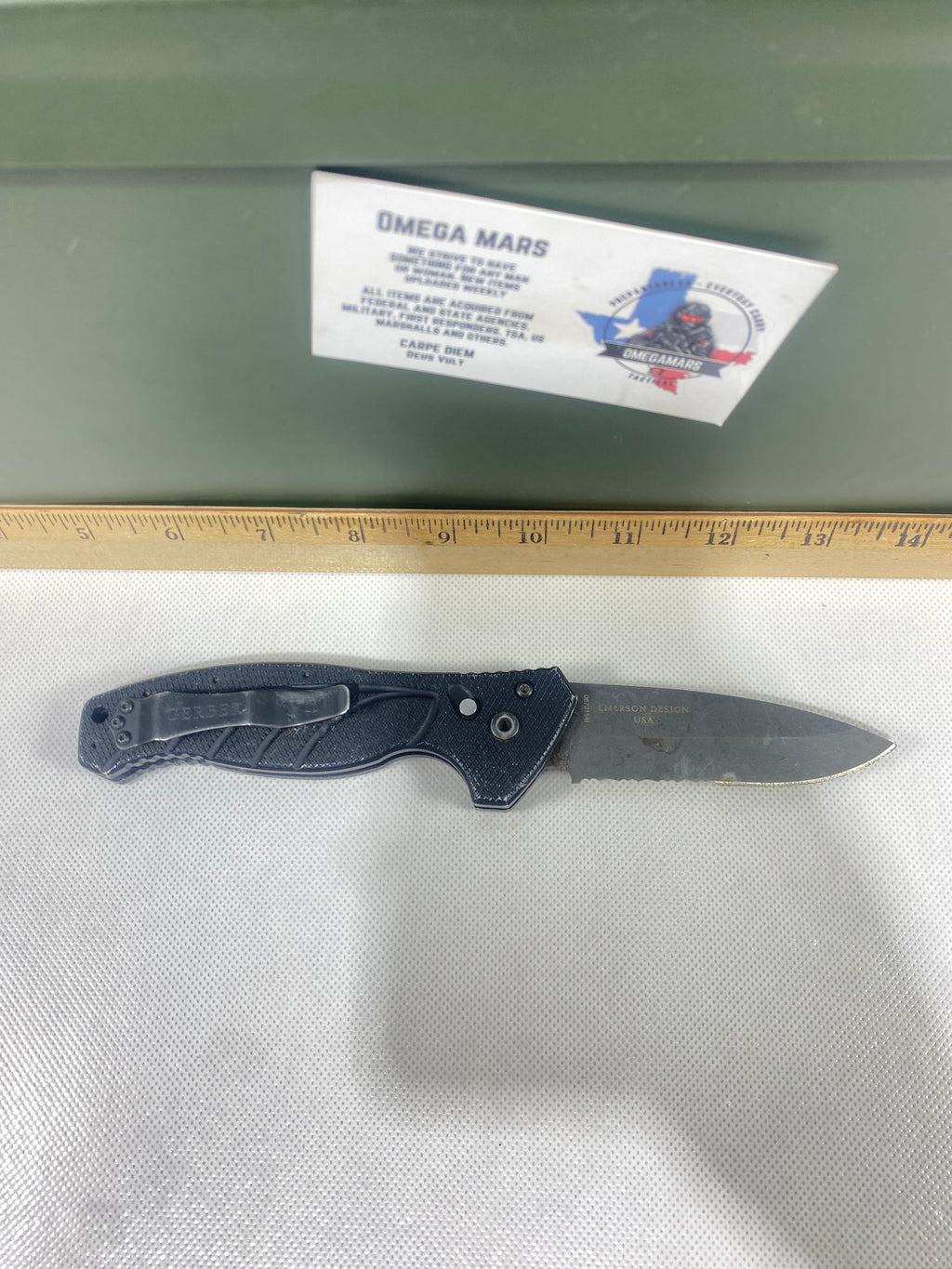 Gerber -73.  Emerson Alliance Tactical. Light usage. Dirty. Chips on blade.