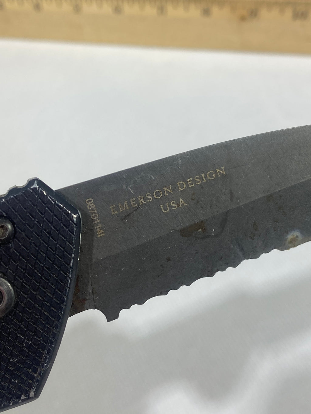 Gerber -73.  Emerson Alliance Tactical. Light usage. Dirty. Chips on blade.