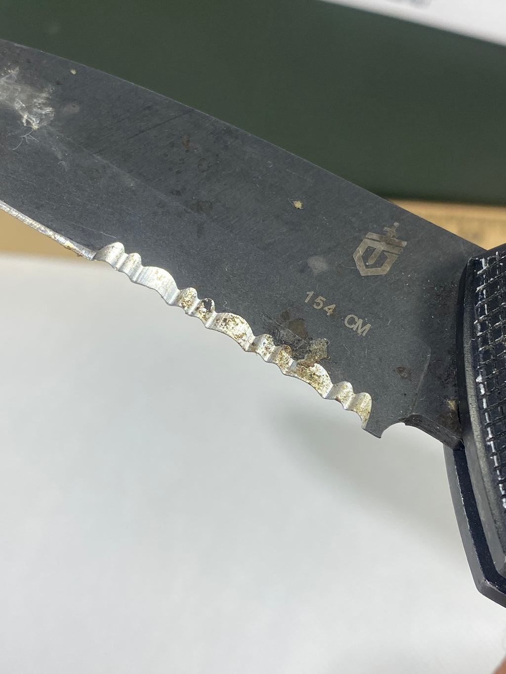 Gerber -73.  Emerson Alliance Tactical. Light usage. Dirty. Chips on blade.