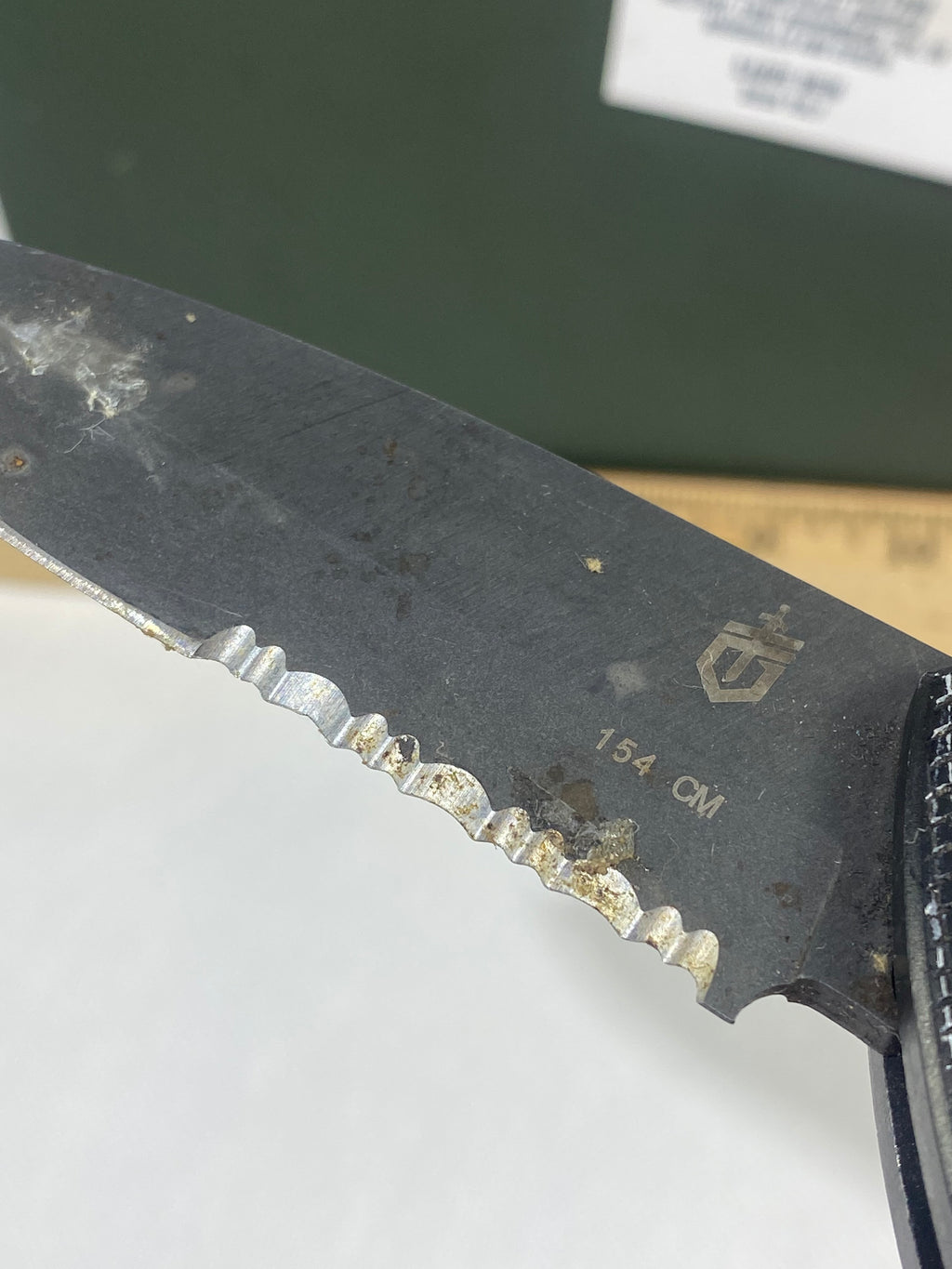 Gerber -73.  Emerson Alliance Tactical. Light usage. Dirty. Chips on blade.