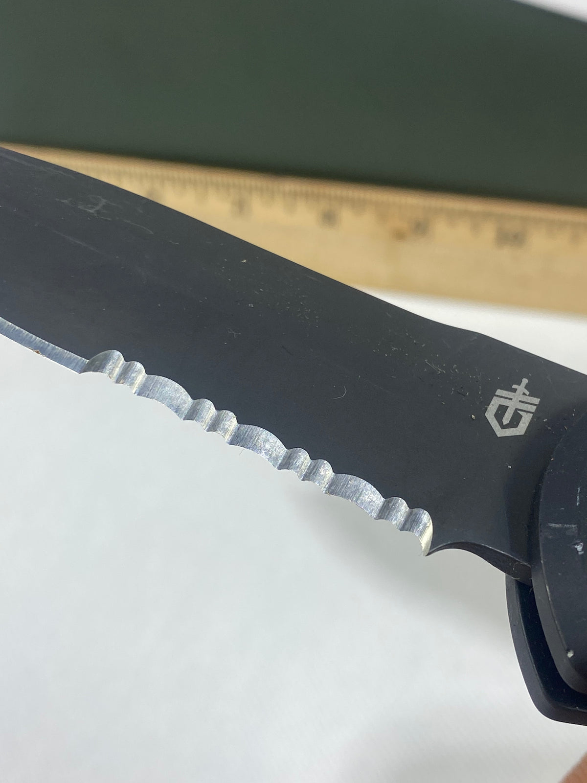 Gerber -74. Empower. Light usage. Dings / chips on blade.