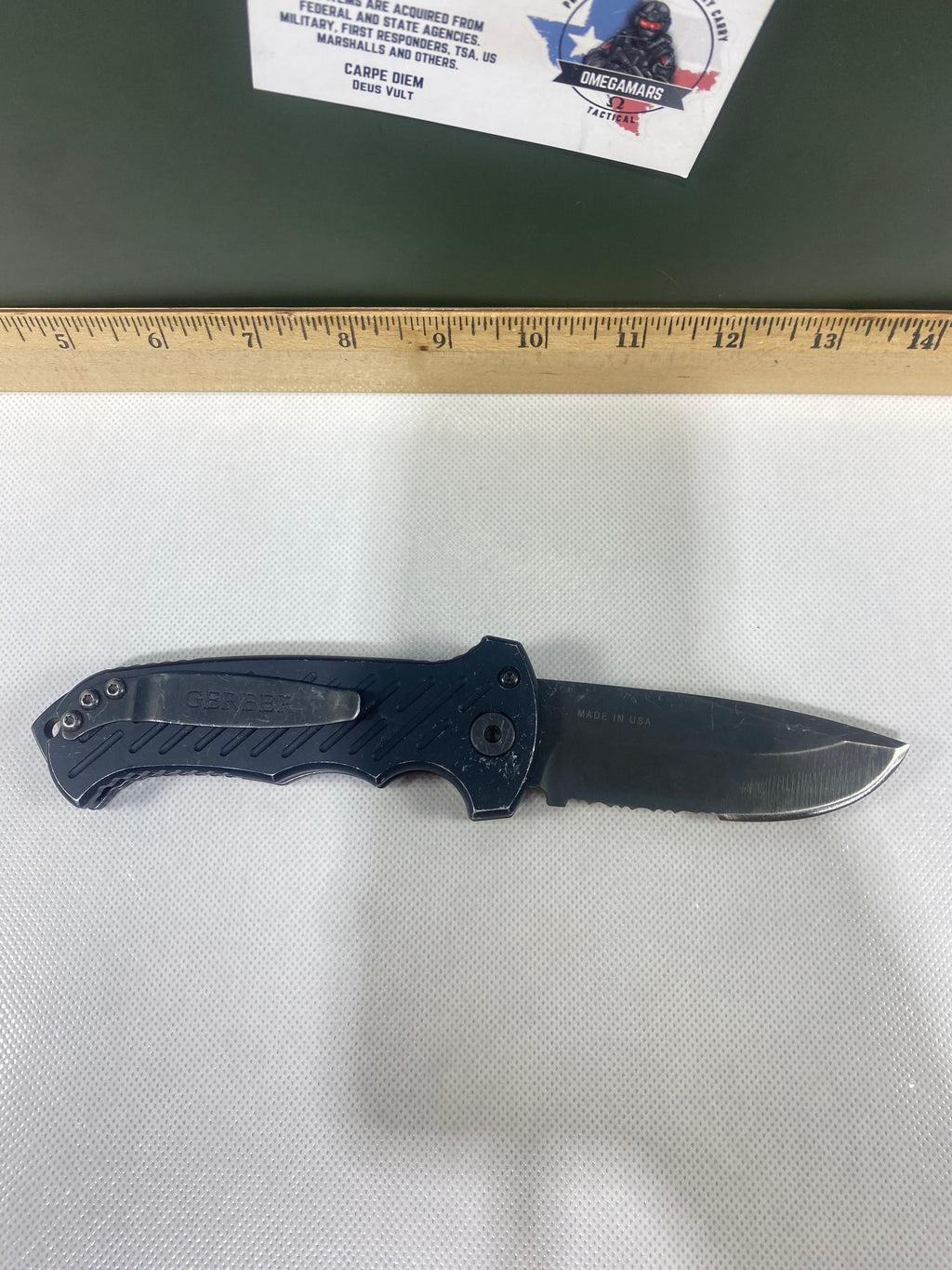 Gerber -77. Light usage. Resharpened.