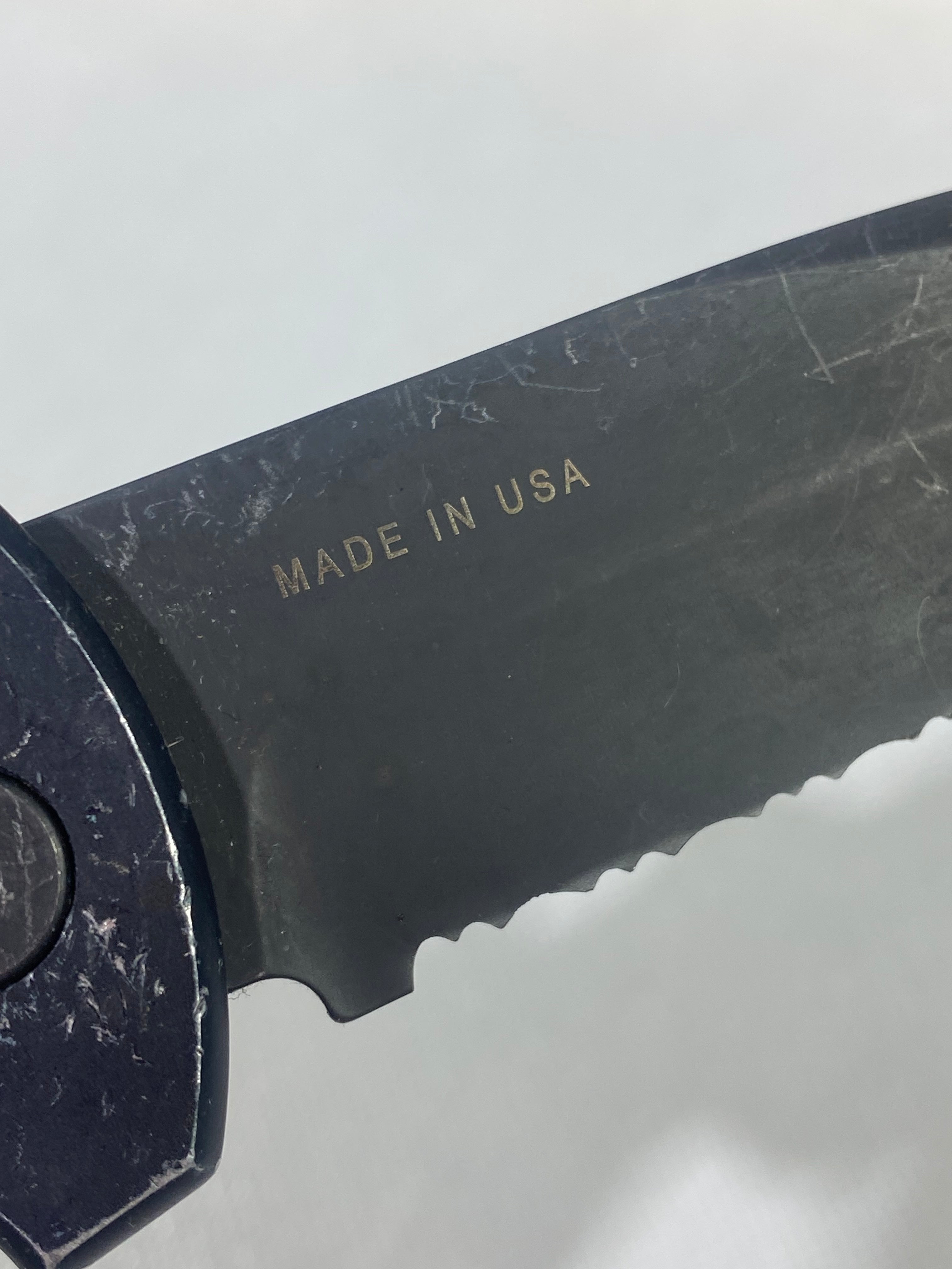 Gerber -77. Light usage. Resharpened.