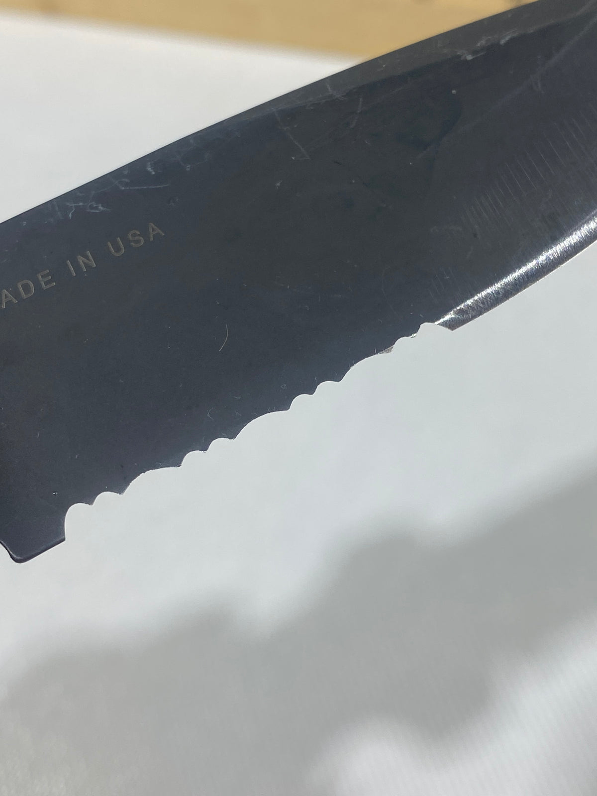 Gerber -77. Light usage. Resharpened.
