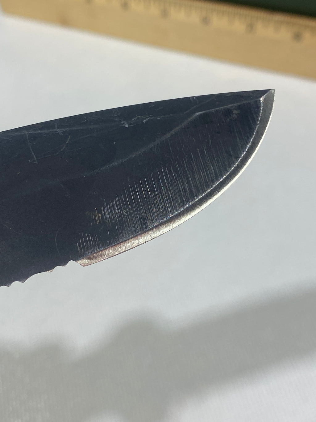 Gerber -77. Light usage. Resharpened.