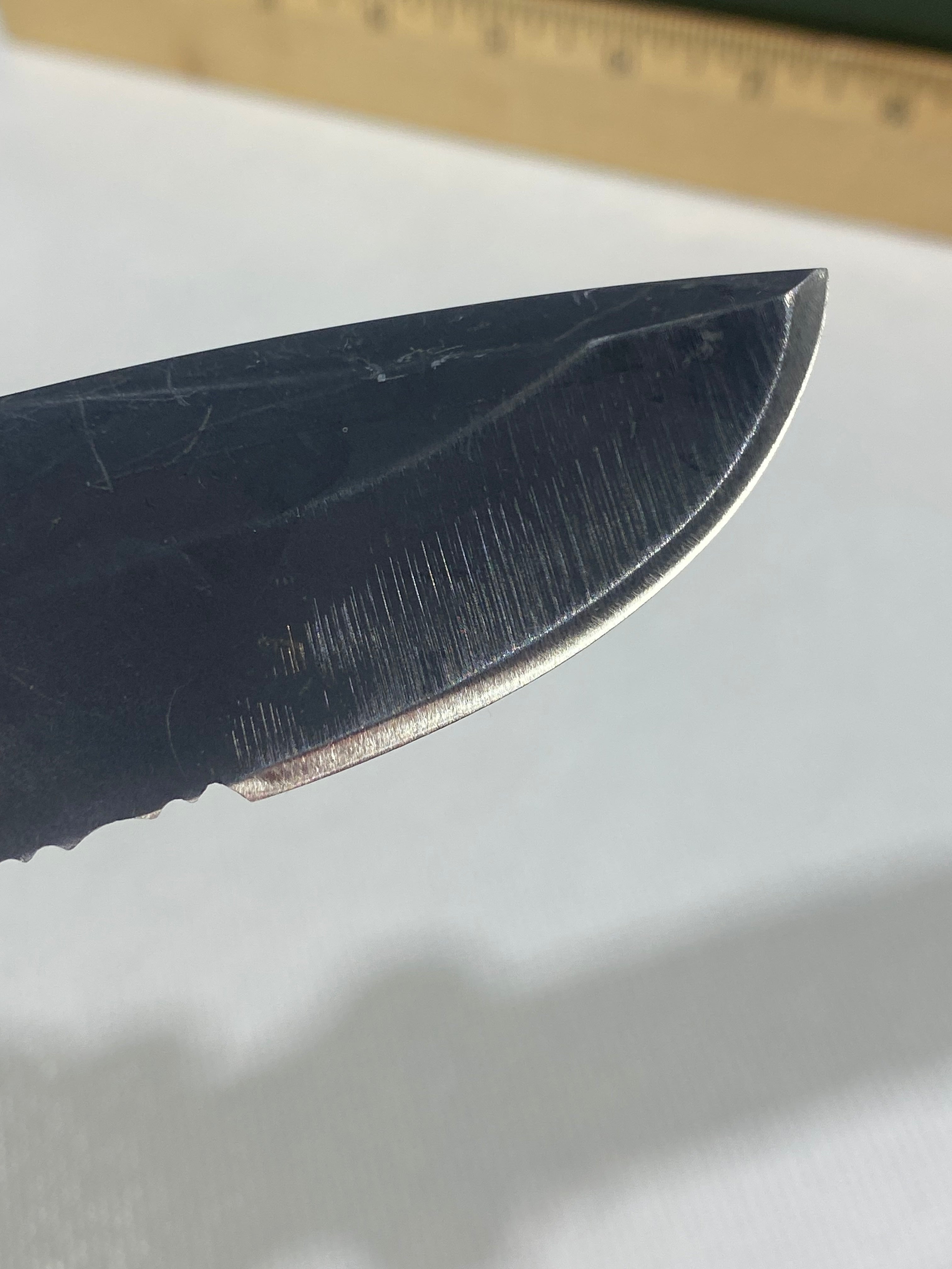Gerber -77. Light usage. Resharpened.