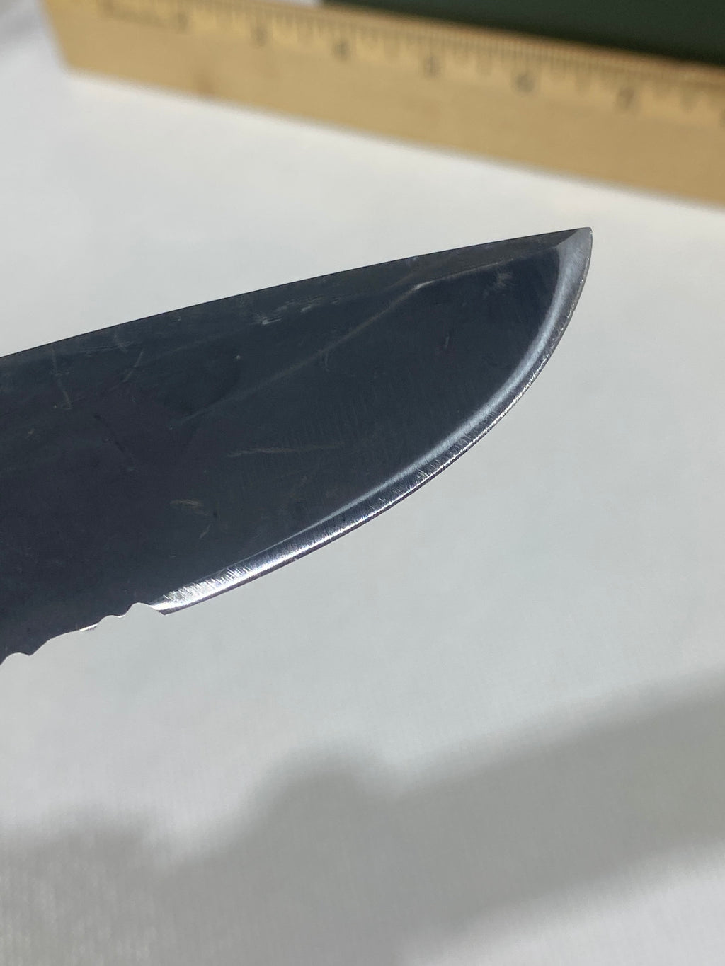 Gerber -77. Light usage. Resharpened.