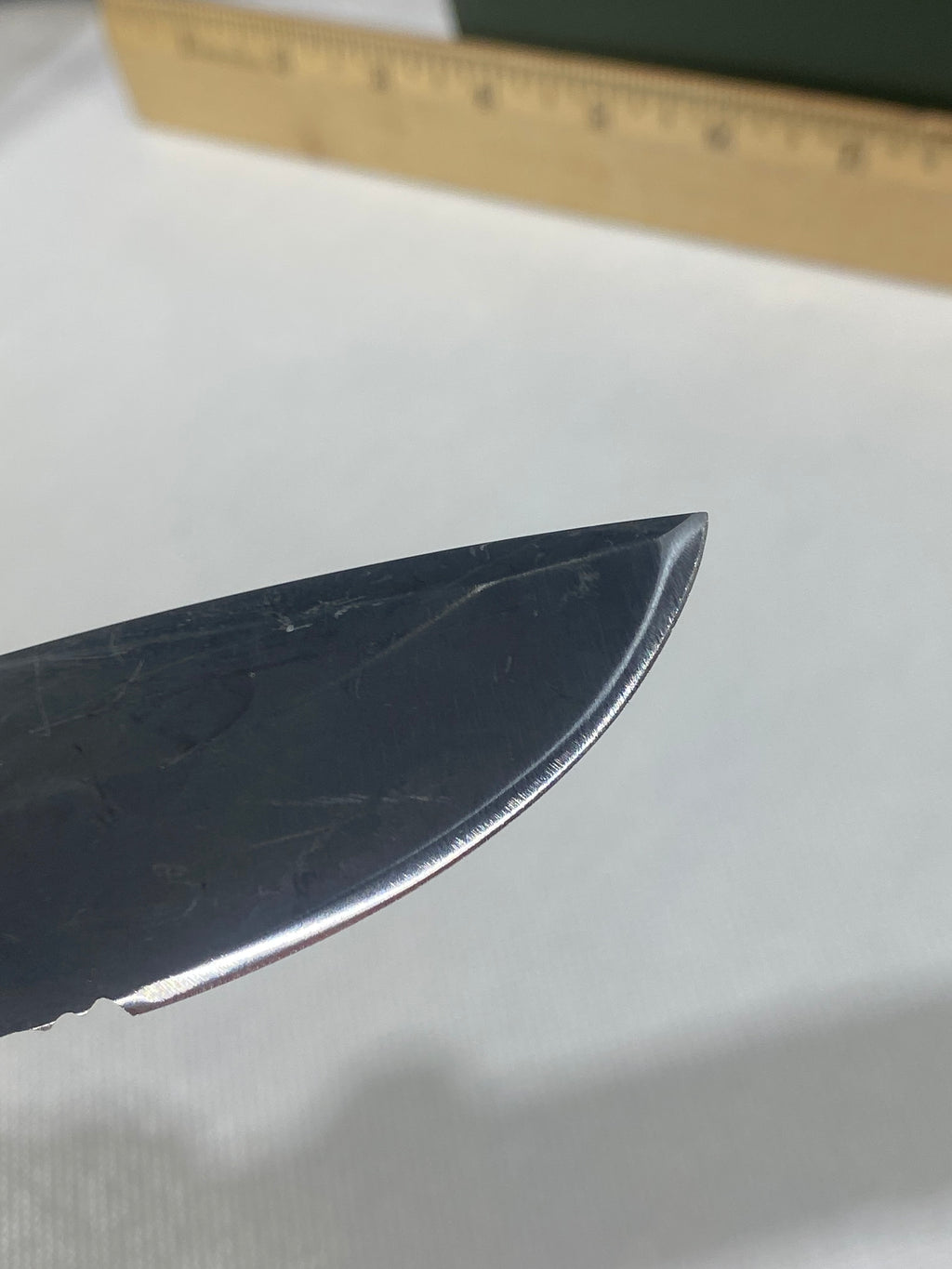 Gerber -77. Light usage. Resharpened.