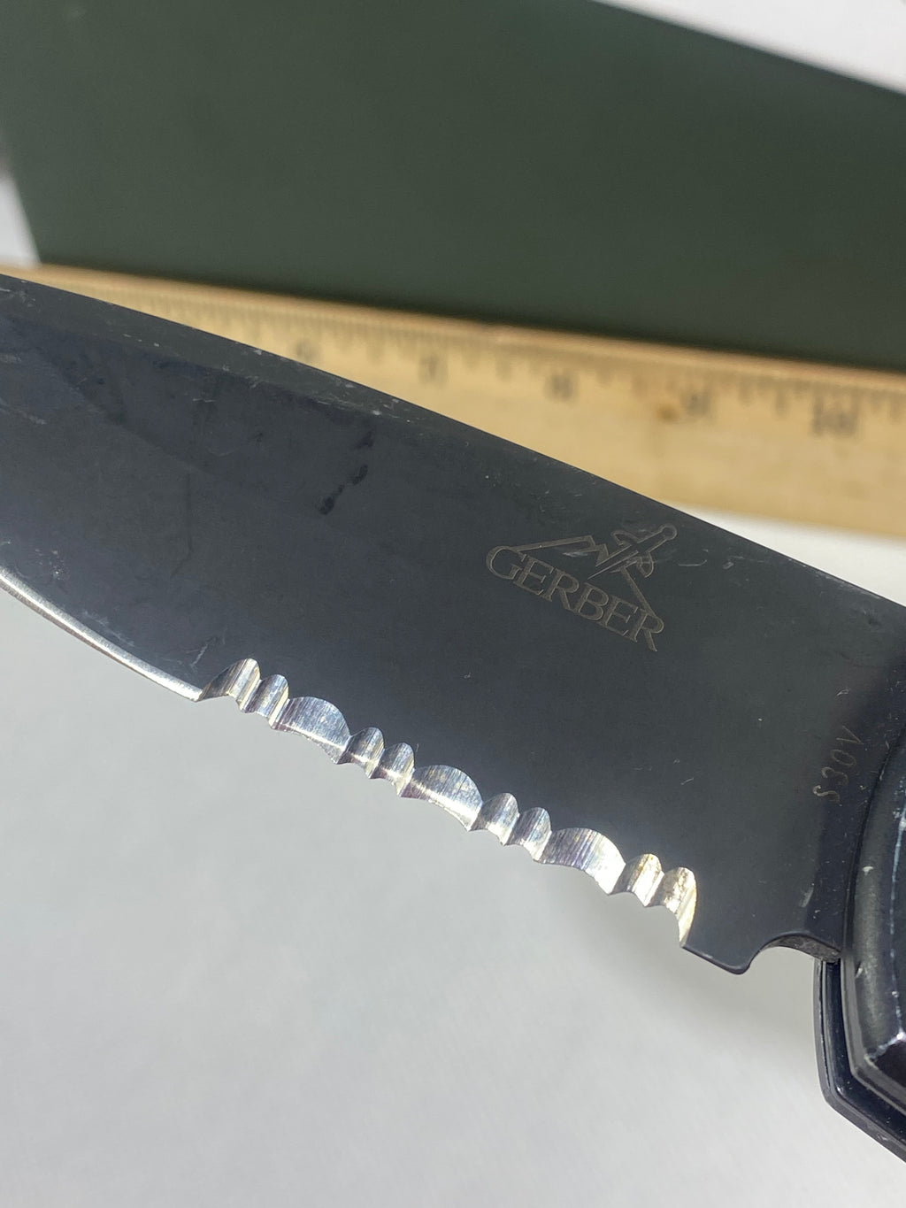 Gerber -77. Light usage. Resharpened.
