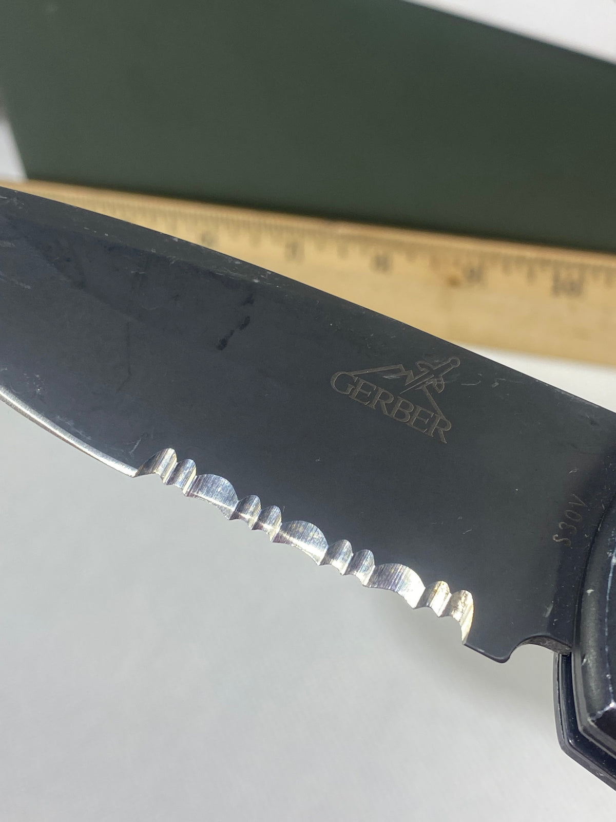 Gerber -77. Light usage. Resharpened.