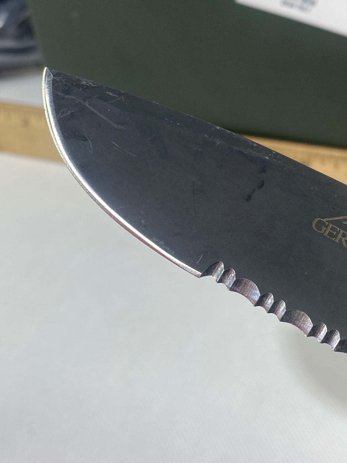 Gerber -77. Light usage. Resharpened.