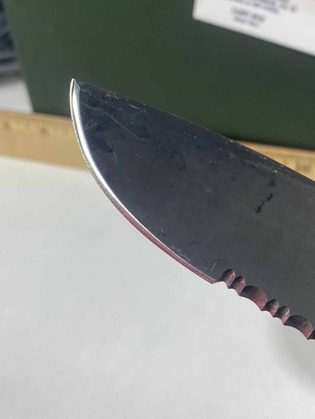 Gerber -77. Light usage. Resharpened.