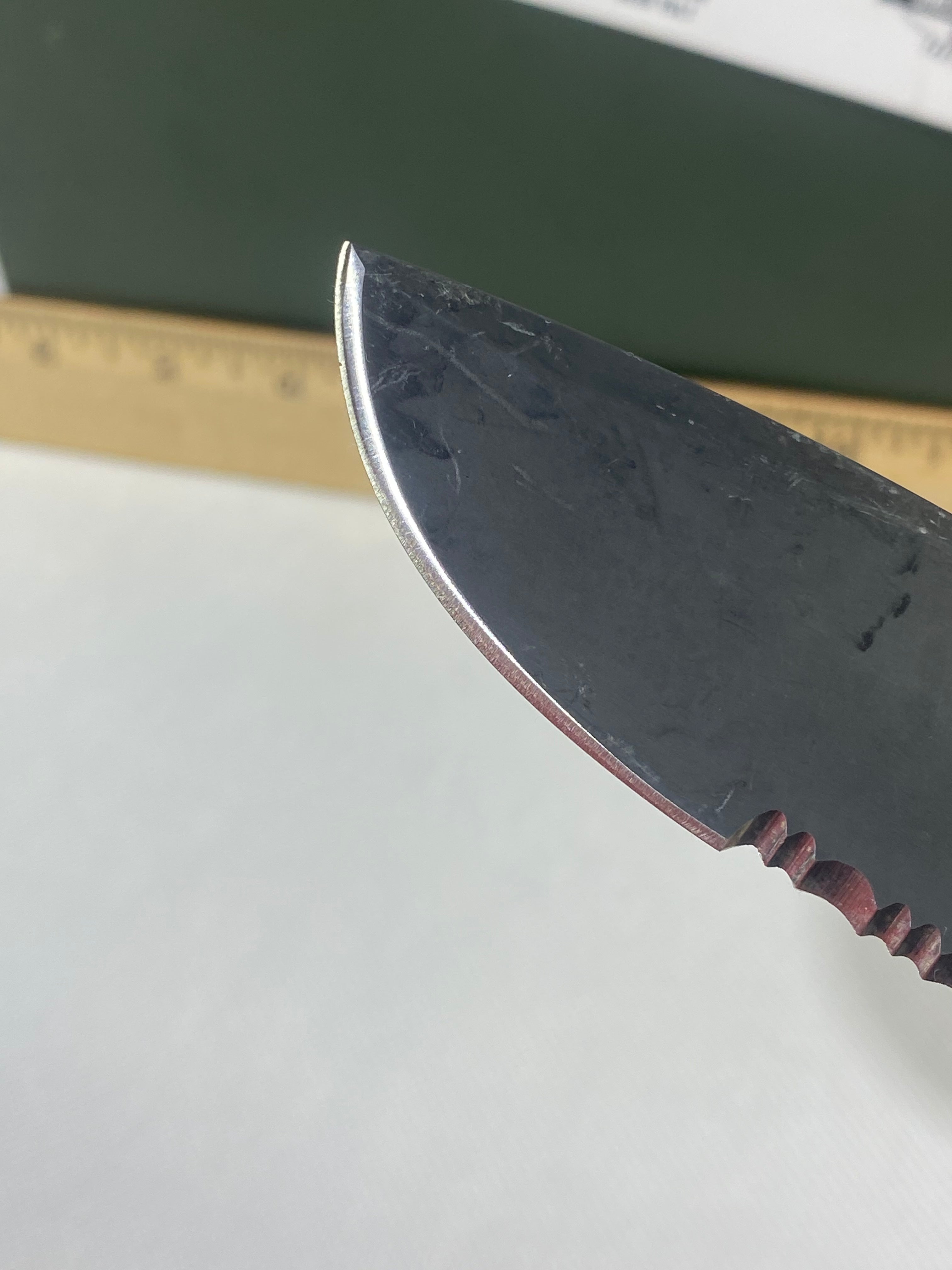 Gerber -77. Light usage. Resharpened.