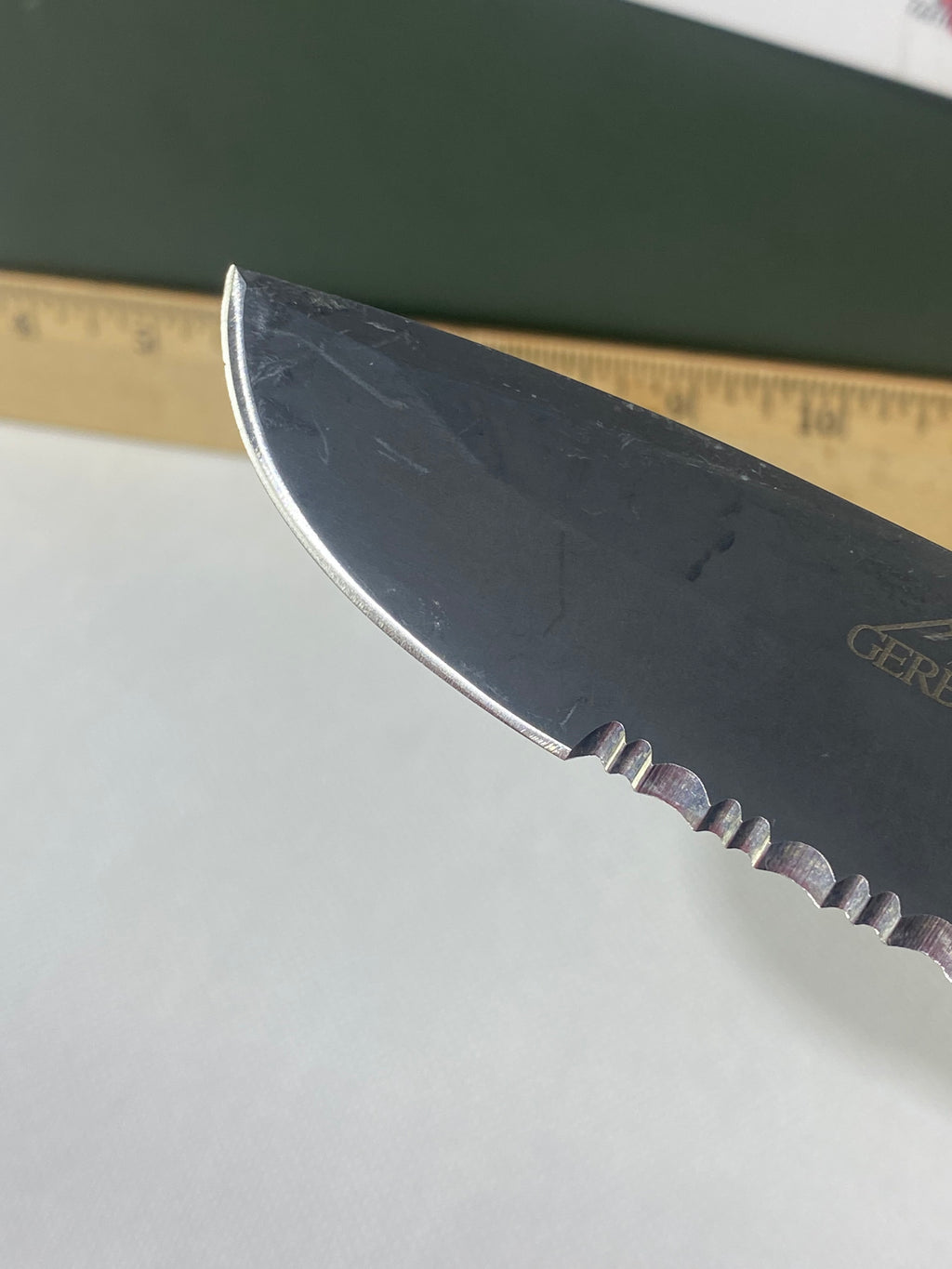 Gerber -77. Light usage. Resharpened.
