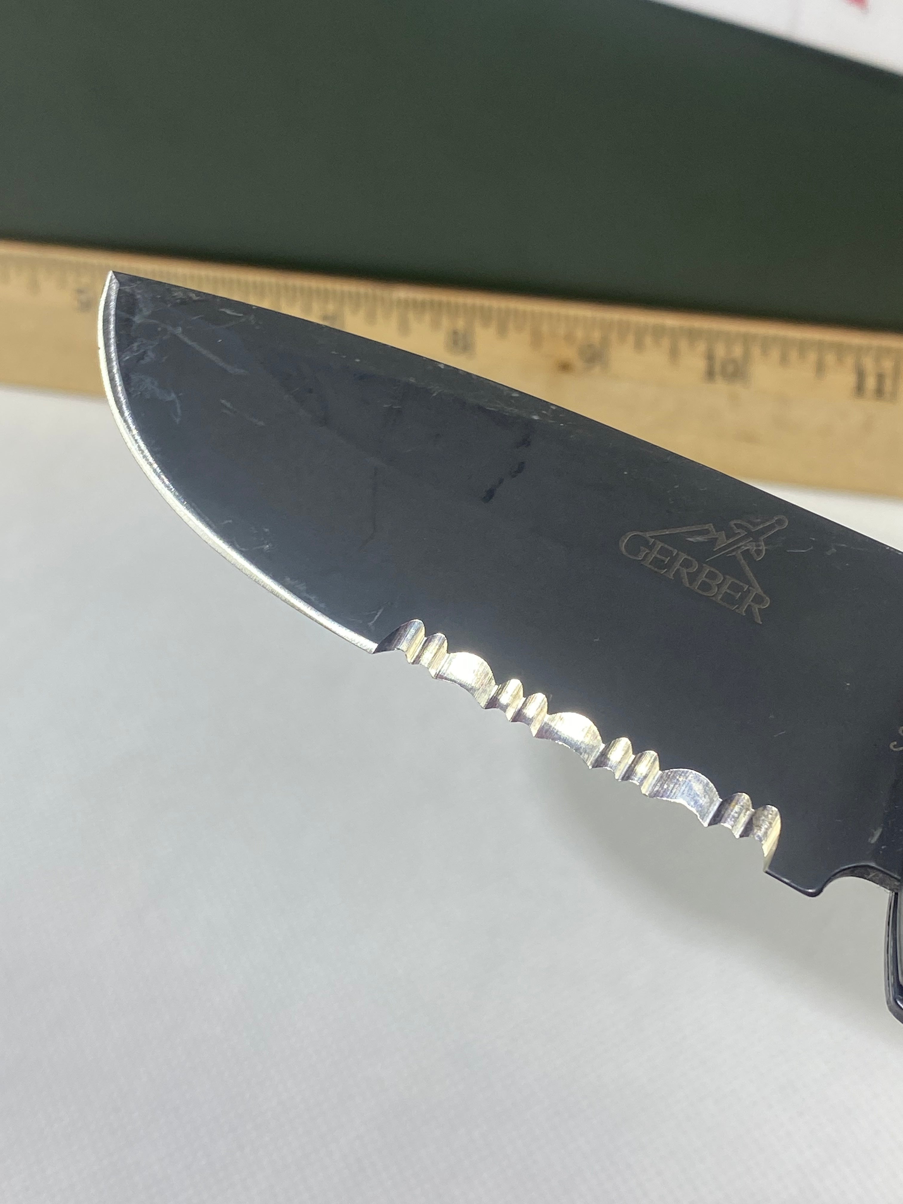 Gerber -77. Light usage. Resharpened.