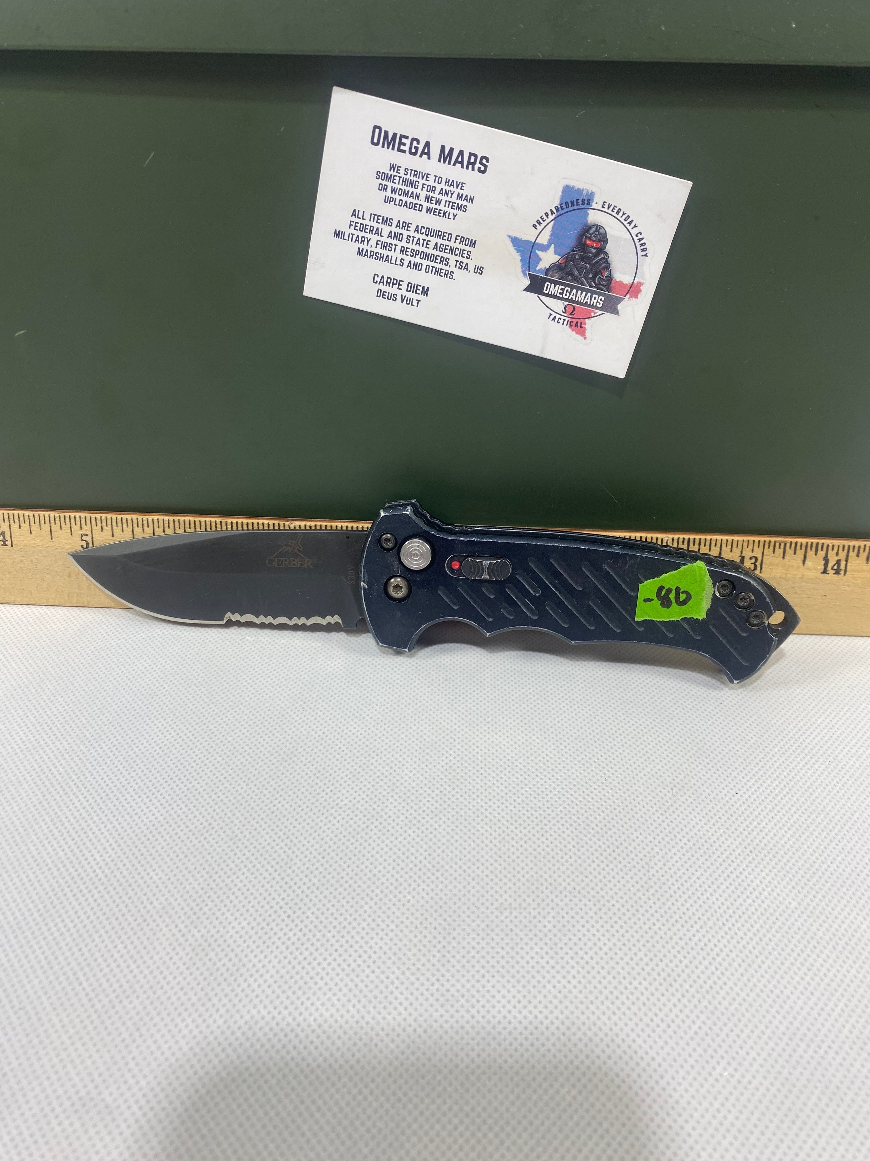 Gerber -80. 06. Light usage. Resharpened. Ding on blade.