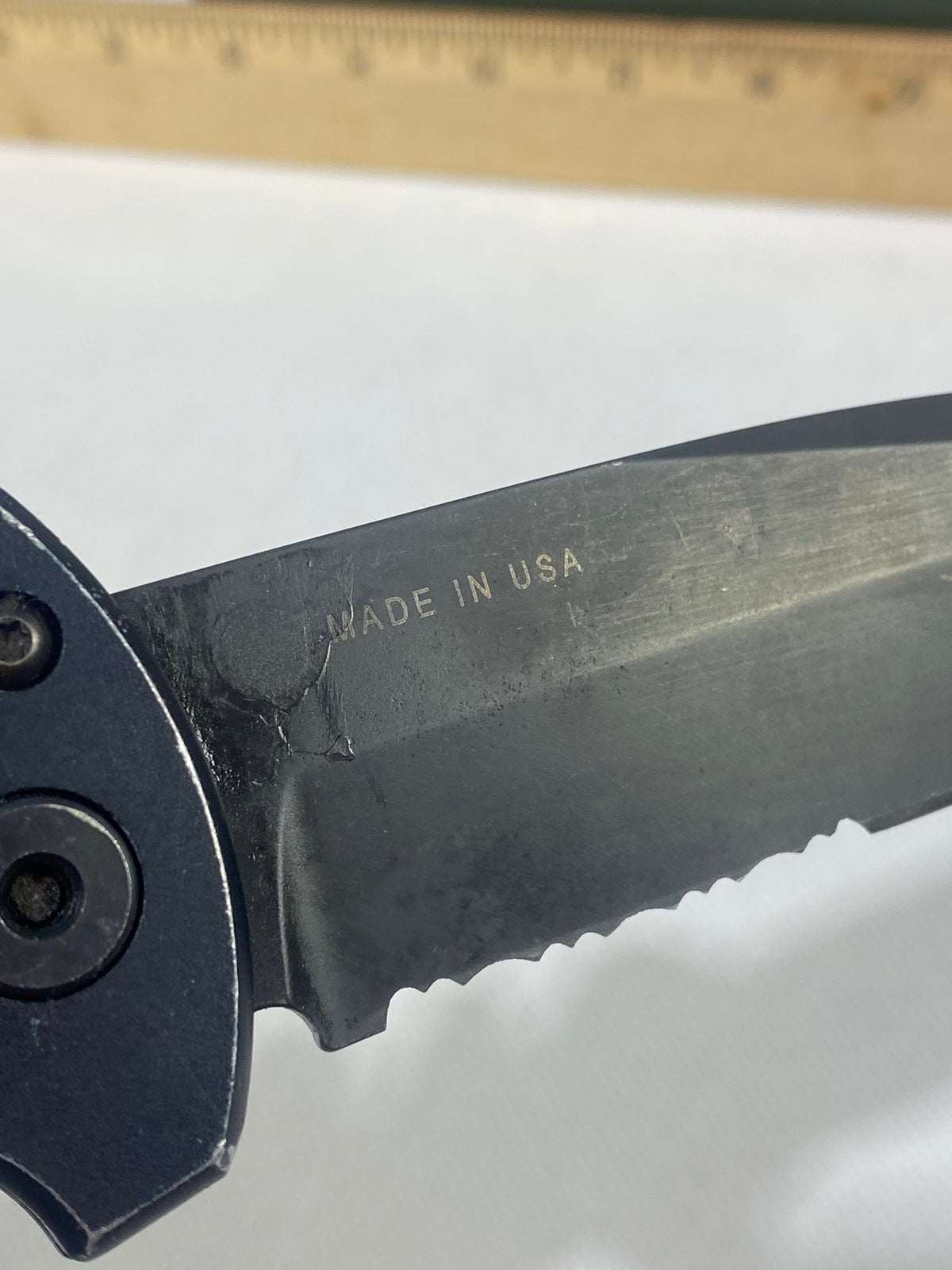 Gerber -80. 06. Light usage. Resharpened. Ding on blade.