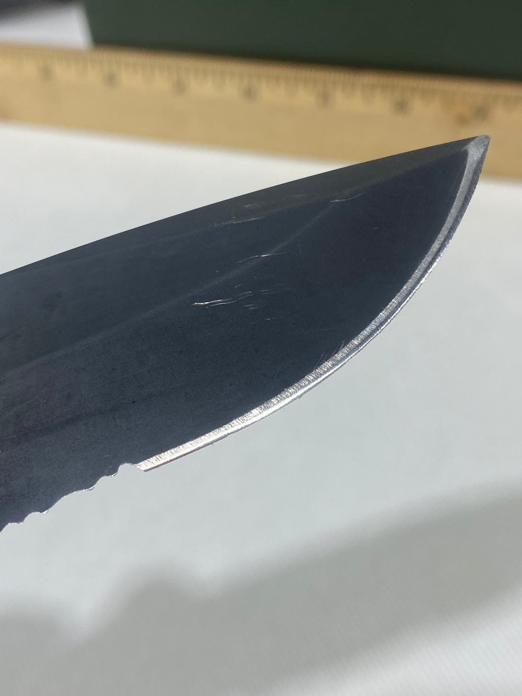 Gerber -80. 06. Light usage. Resharpened. Ding on blade.
