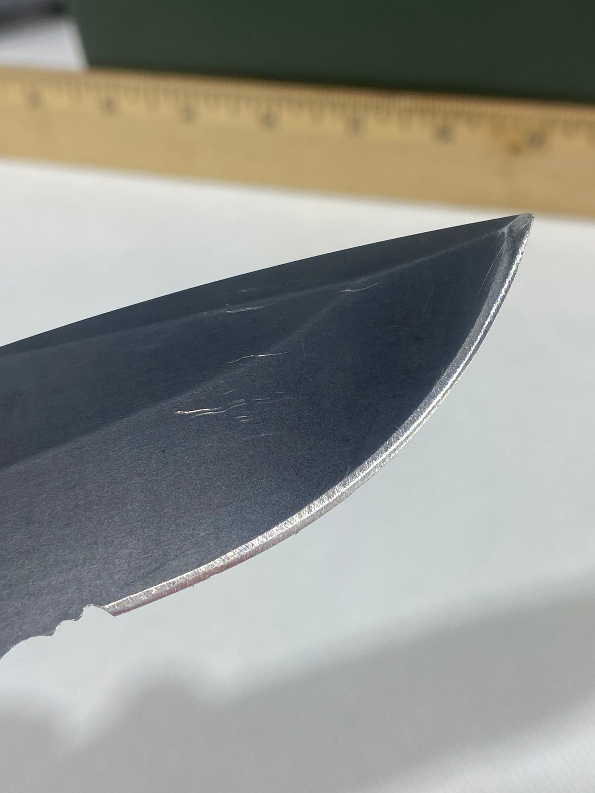 Gerber -80. 06. Light usage. Resharpened. Ding on blade.