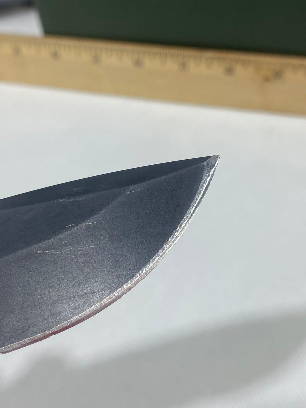Gerber -80. 06. Light usage. Resharpened. Ding on blade.