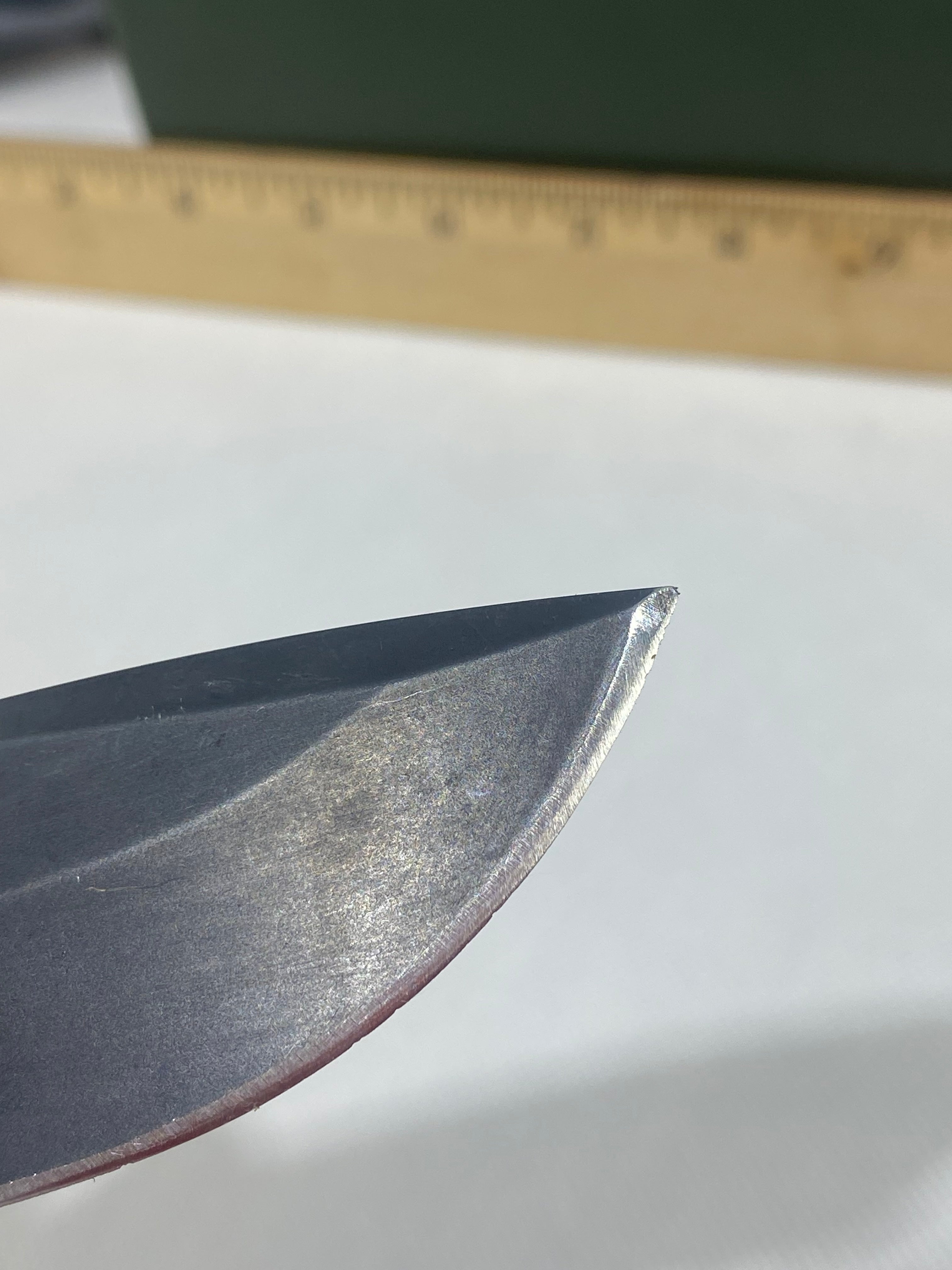 Gerber -80. 06. Light usage. Resharpened. Ding on blade.