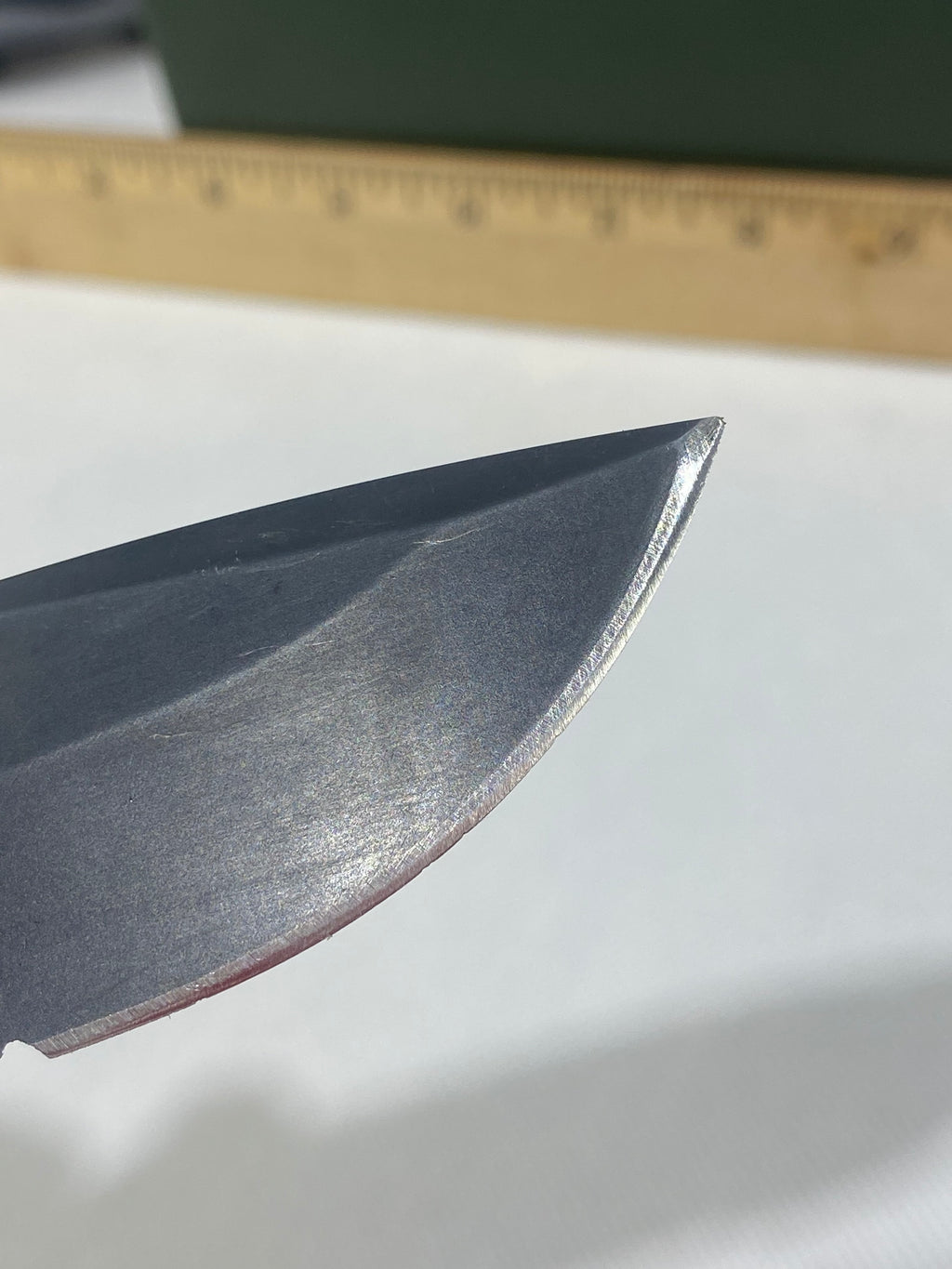 Gerber -80. 06. Light usage. Resharpened. Ding on blade.