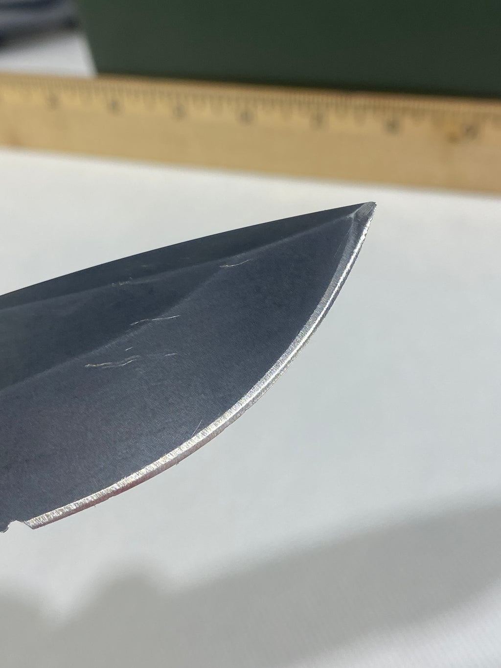 Gerber -80. 06. Light usage. Resharpened. Ding on blade.