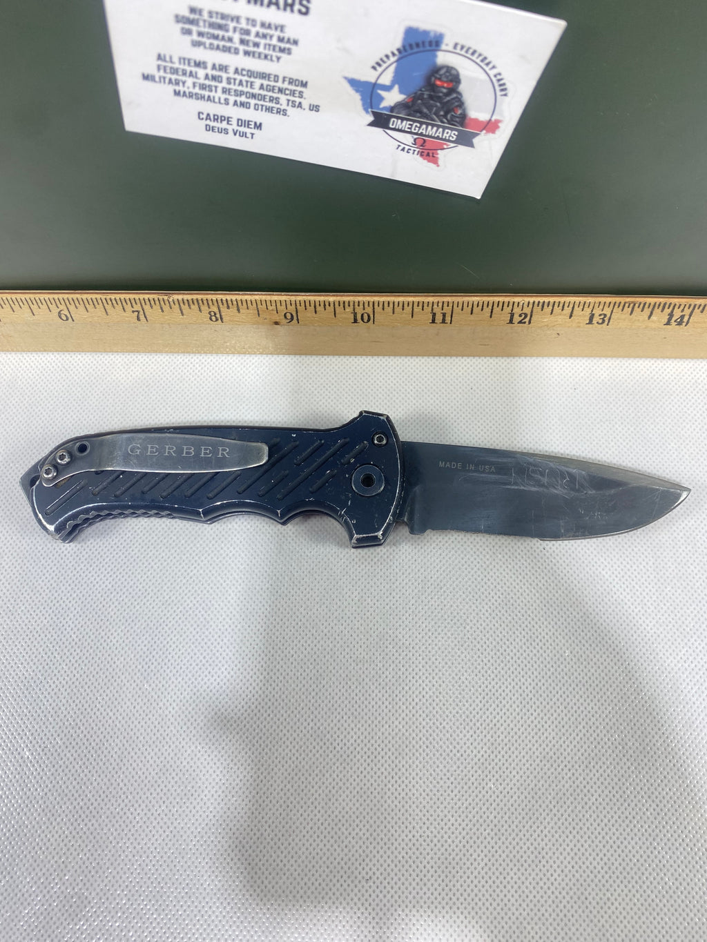 Gerber -85. 06. Light usage. Resharpened. A name is scratched into the blade. Needs Oil.
