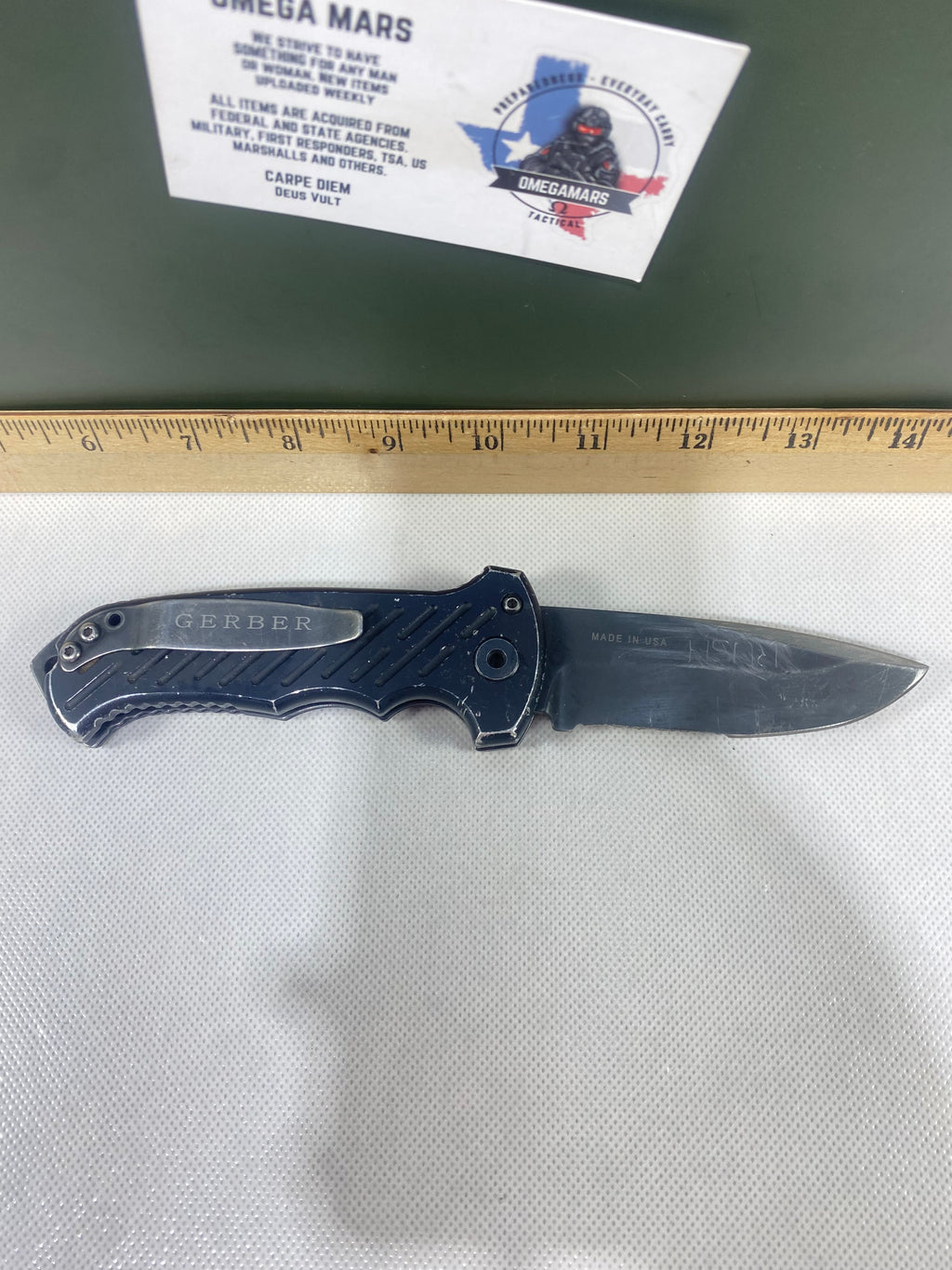 Gerber -85. 06. Light usage. Resharpened. A name is scratched into the blade. Needs Oil.