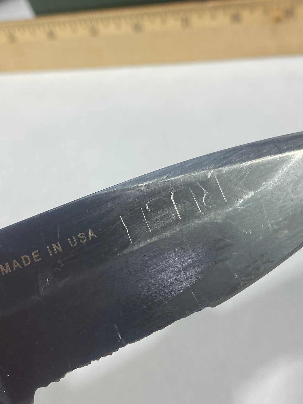 Gerber -85. 06. Light usage. Resharpened. A name is scratched into the blade. Needs Oil.