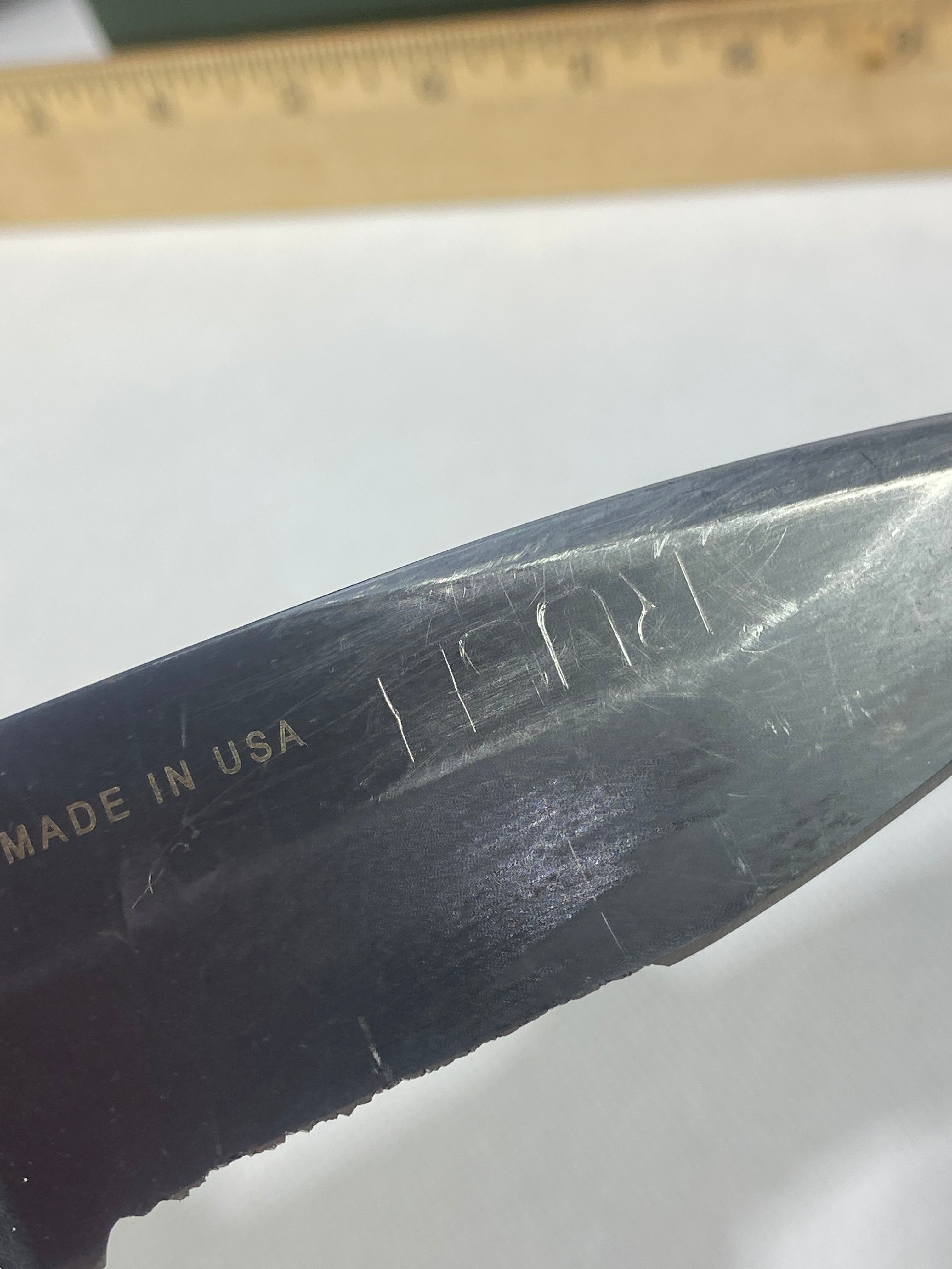 Gerber -85. 06. Light usage. Resharpened. A name is scratched into the blade. Needs Oil.