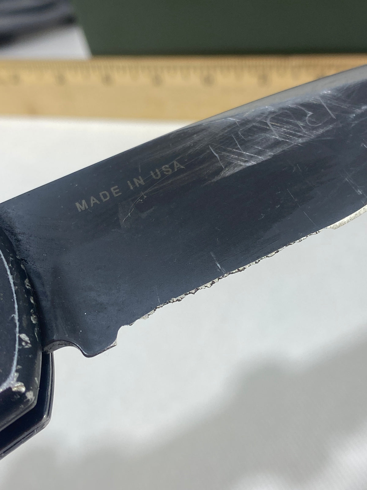 Gerber -85. 06. Light usage. Resharpened. A name is scratched into the blade. Needs Oil.